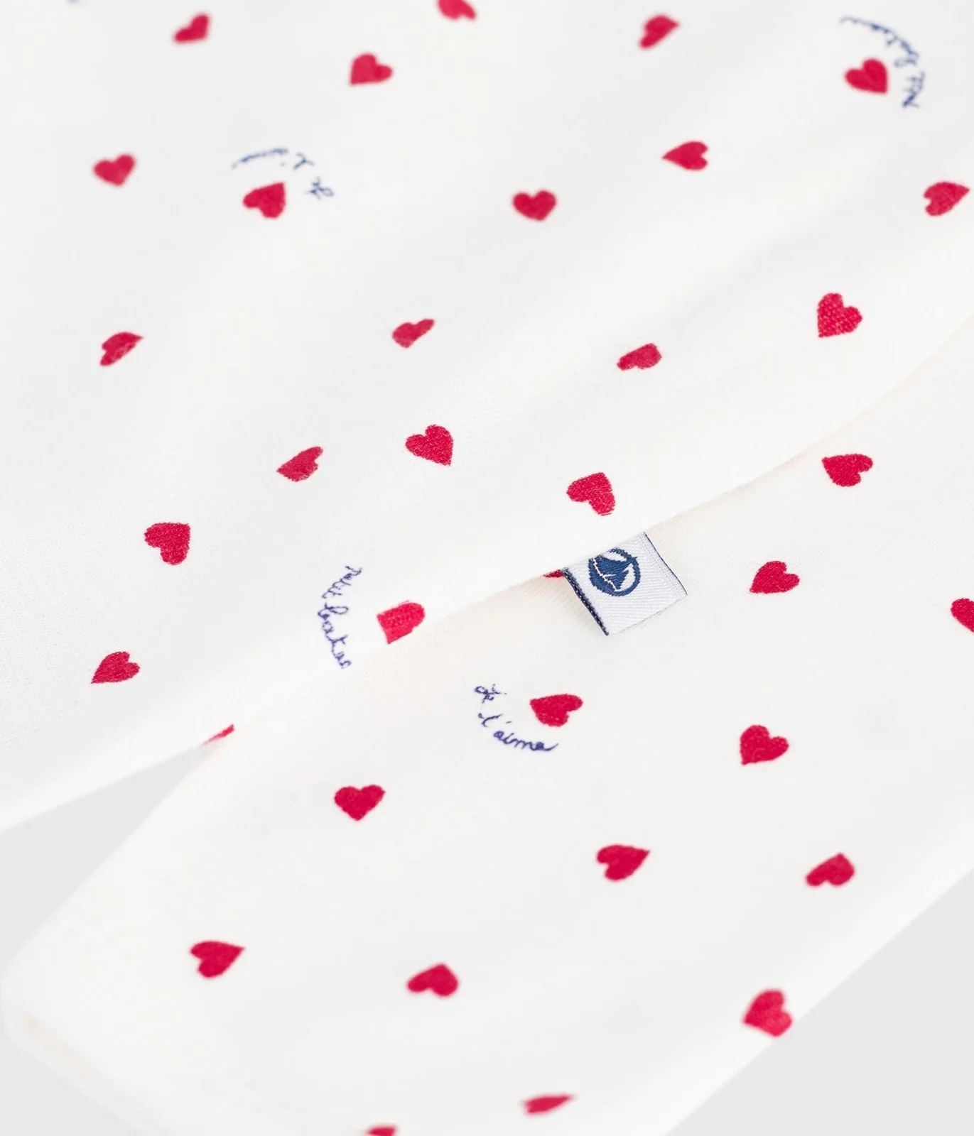 Babies' cotton pyjama suit printed with little hearts