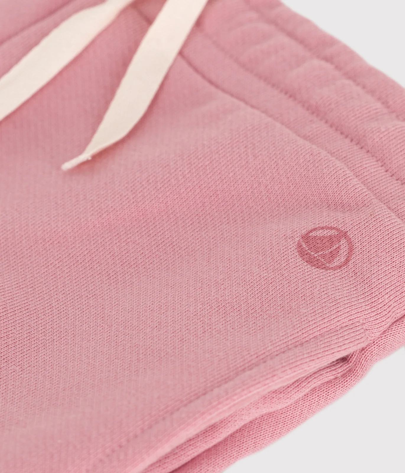Children's jogging bottoms in plain cotton