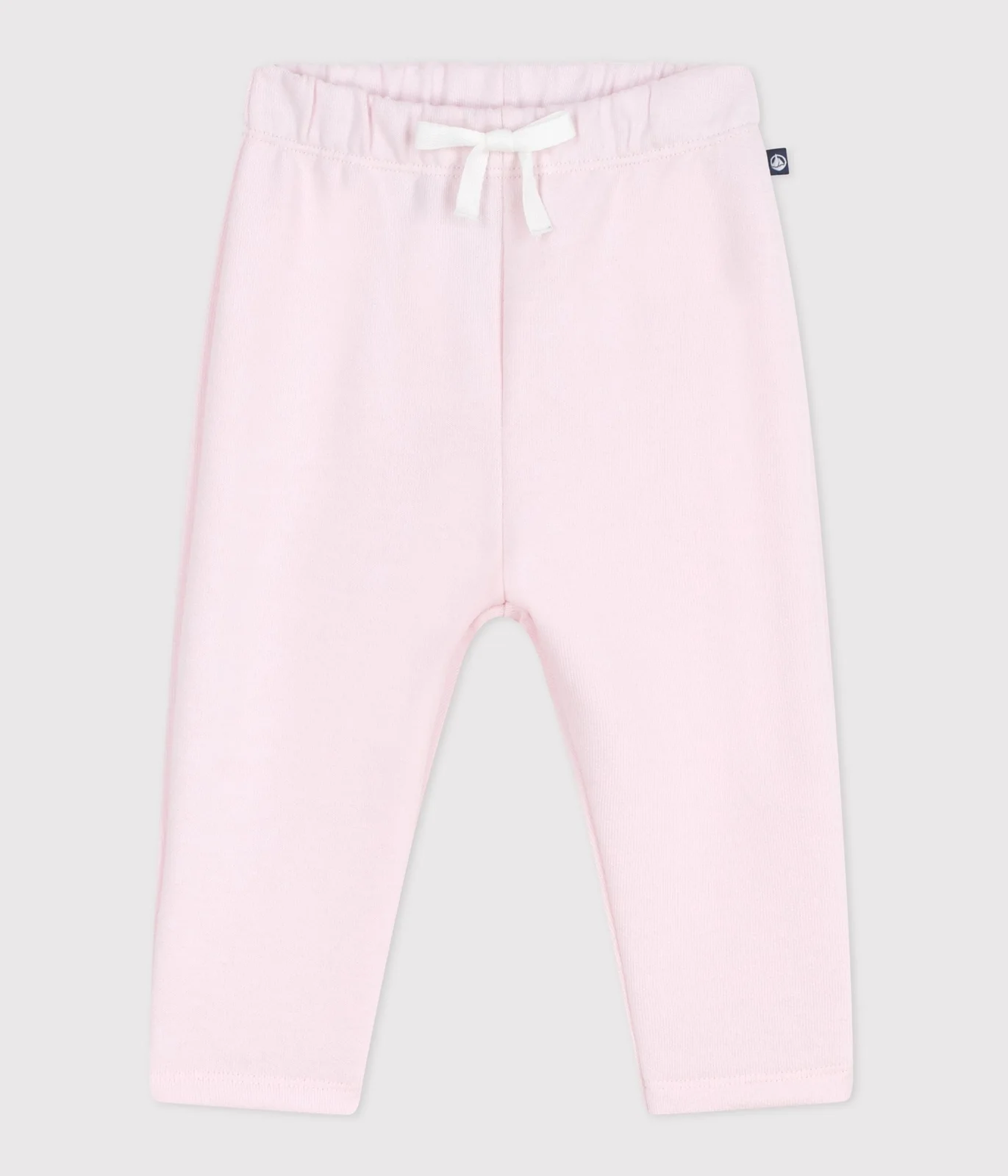 Babies' jogging bottoms in plain cotton