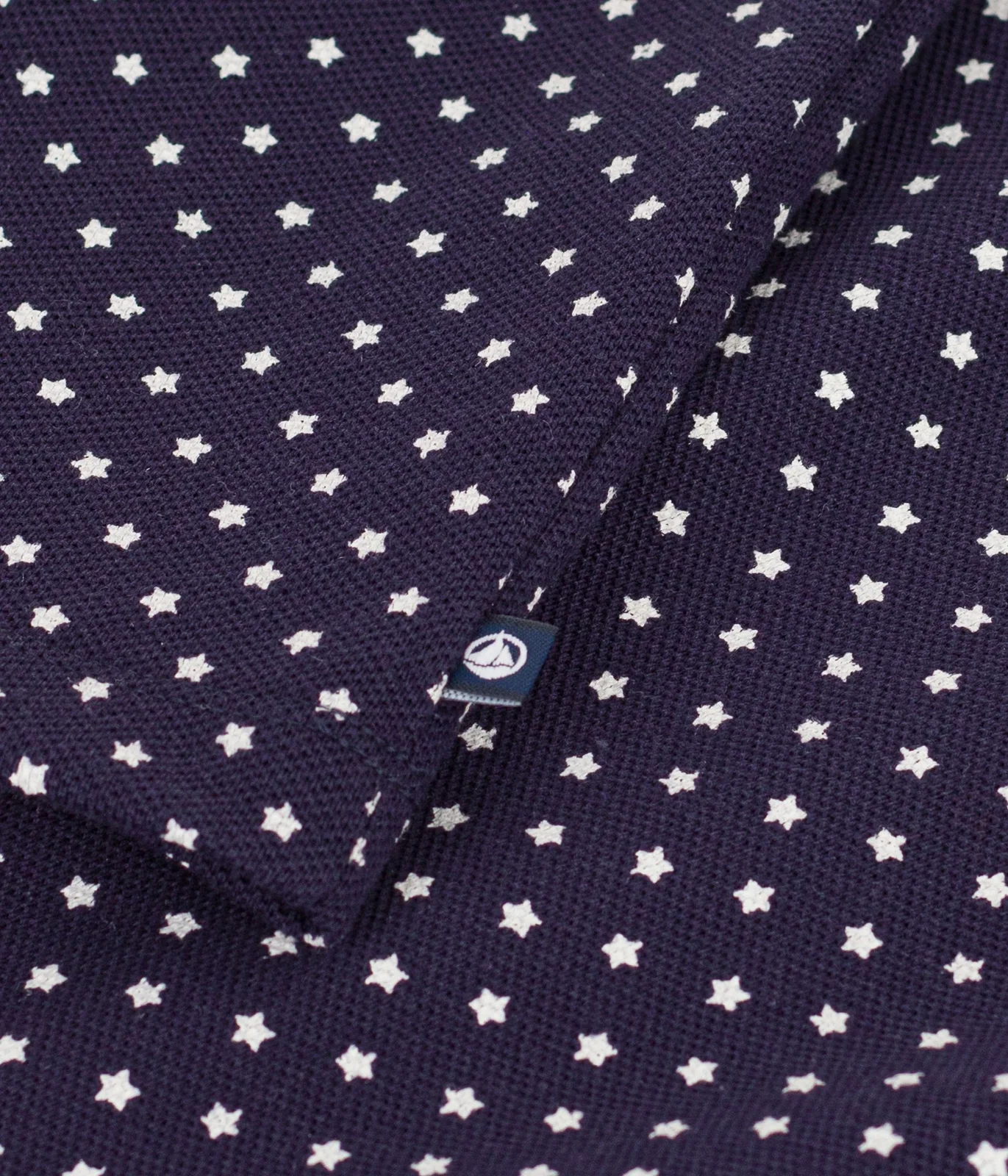 Children's cotton polo shirt with short sleeves and a star print
