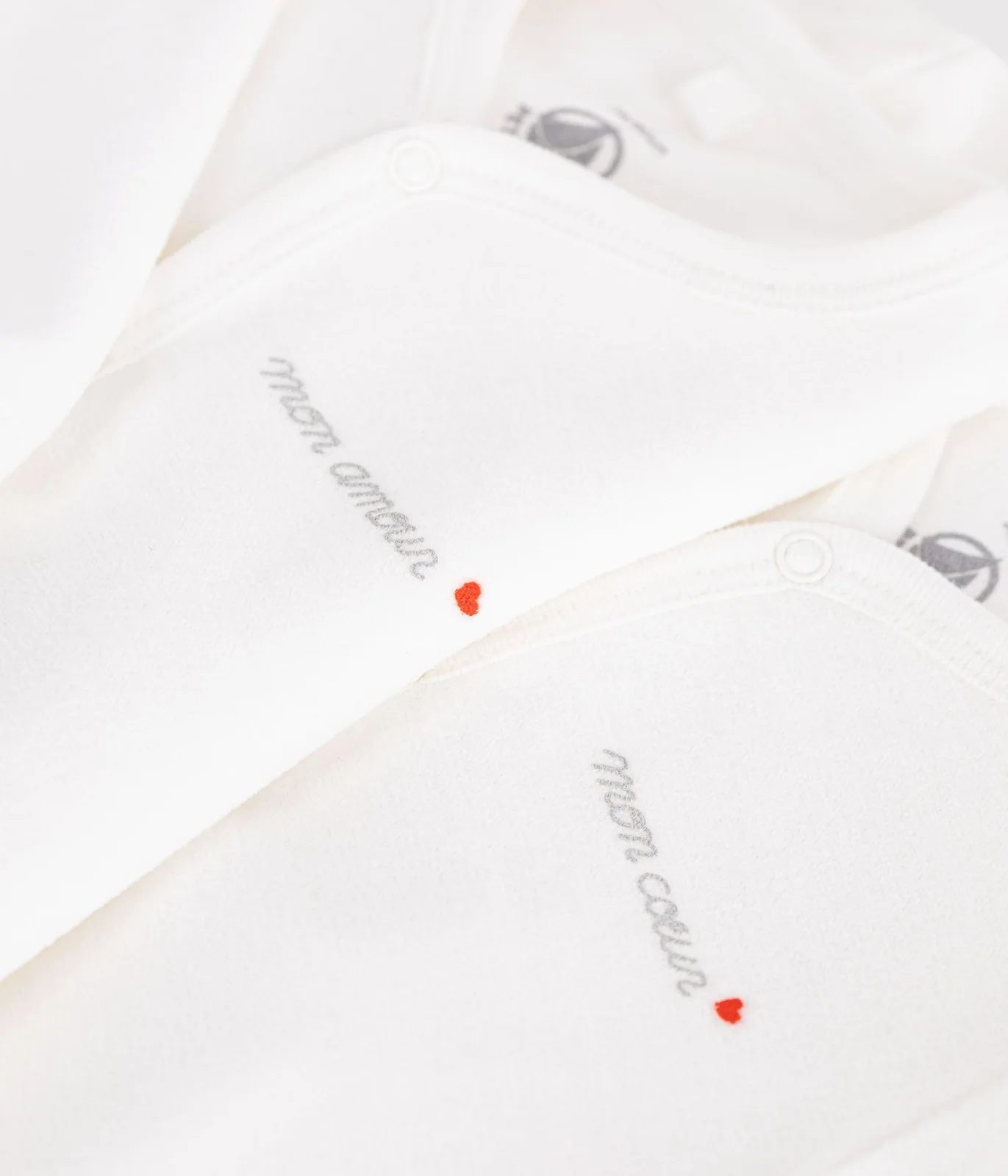 Pack of babies' velour pyjama suits