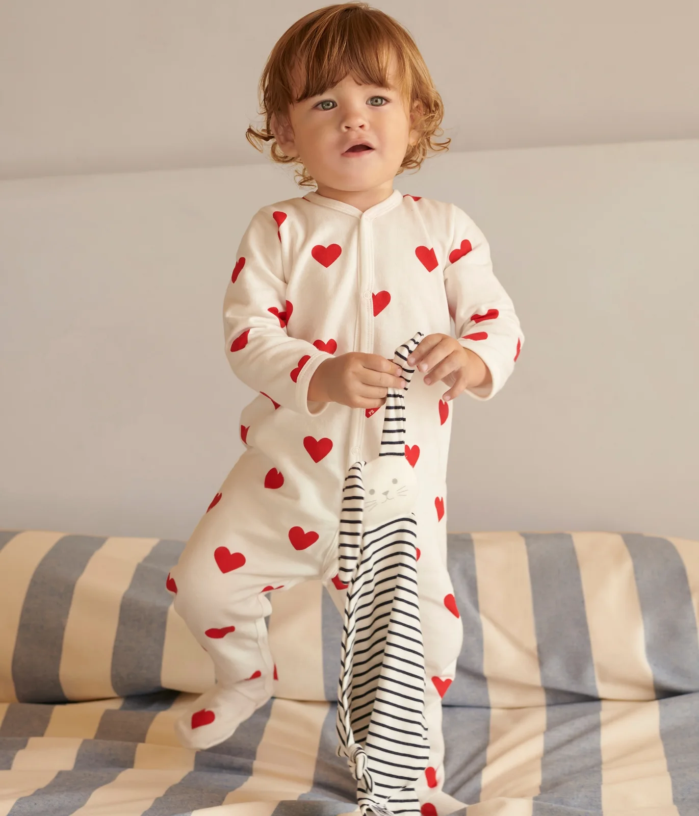 Baby fleece pyjamas with red hearts
