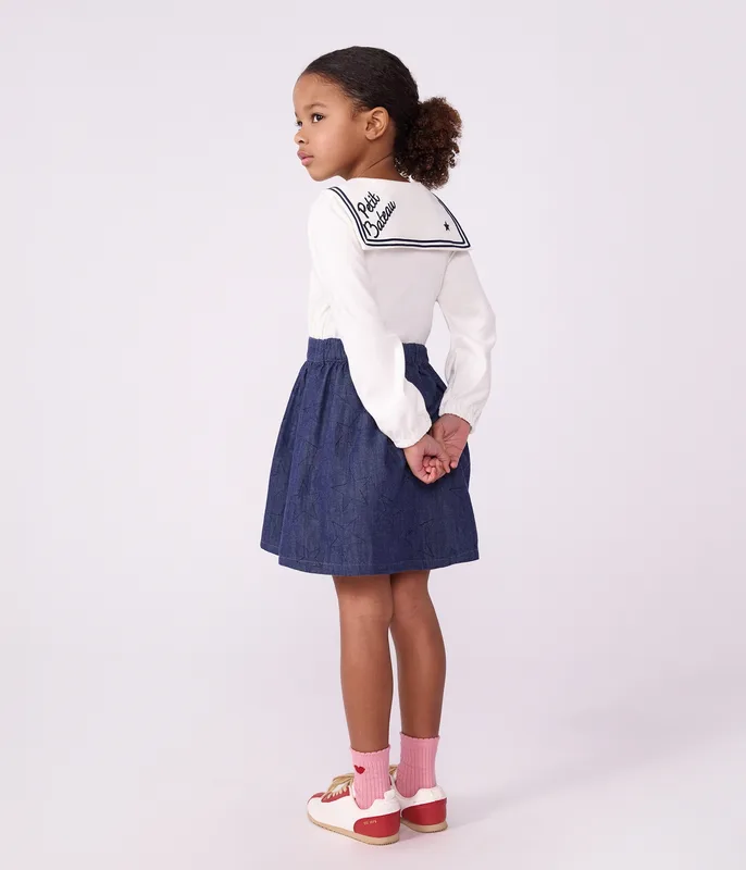 Short skirt in plain denim with a star pattern