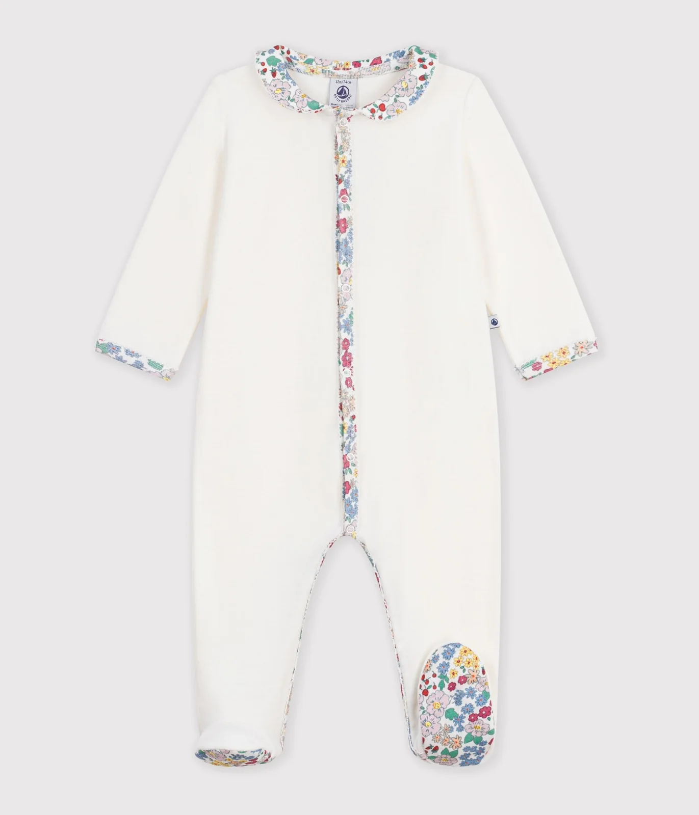 Babies' pyjama suit in plain velour with a collar and floral print detail