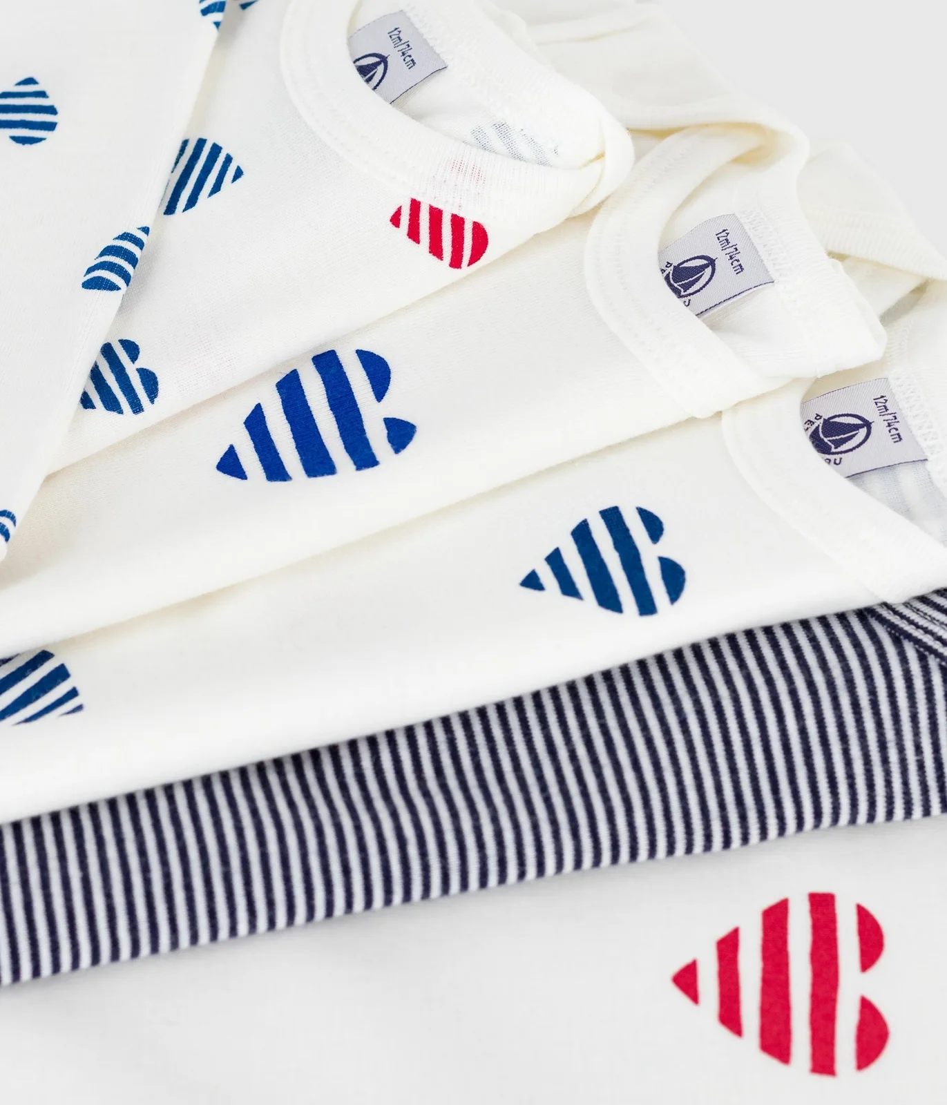 Pack of long-sleeved heart-print cotton bodies for babies