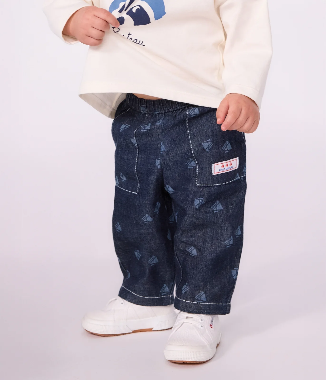Babies' trousers in boat print denim