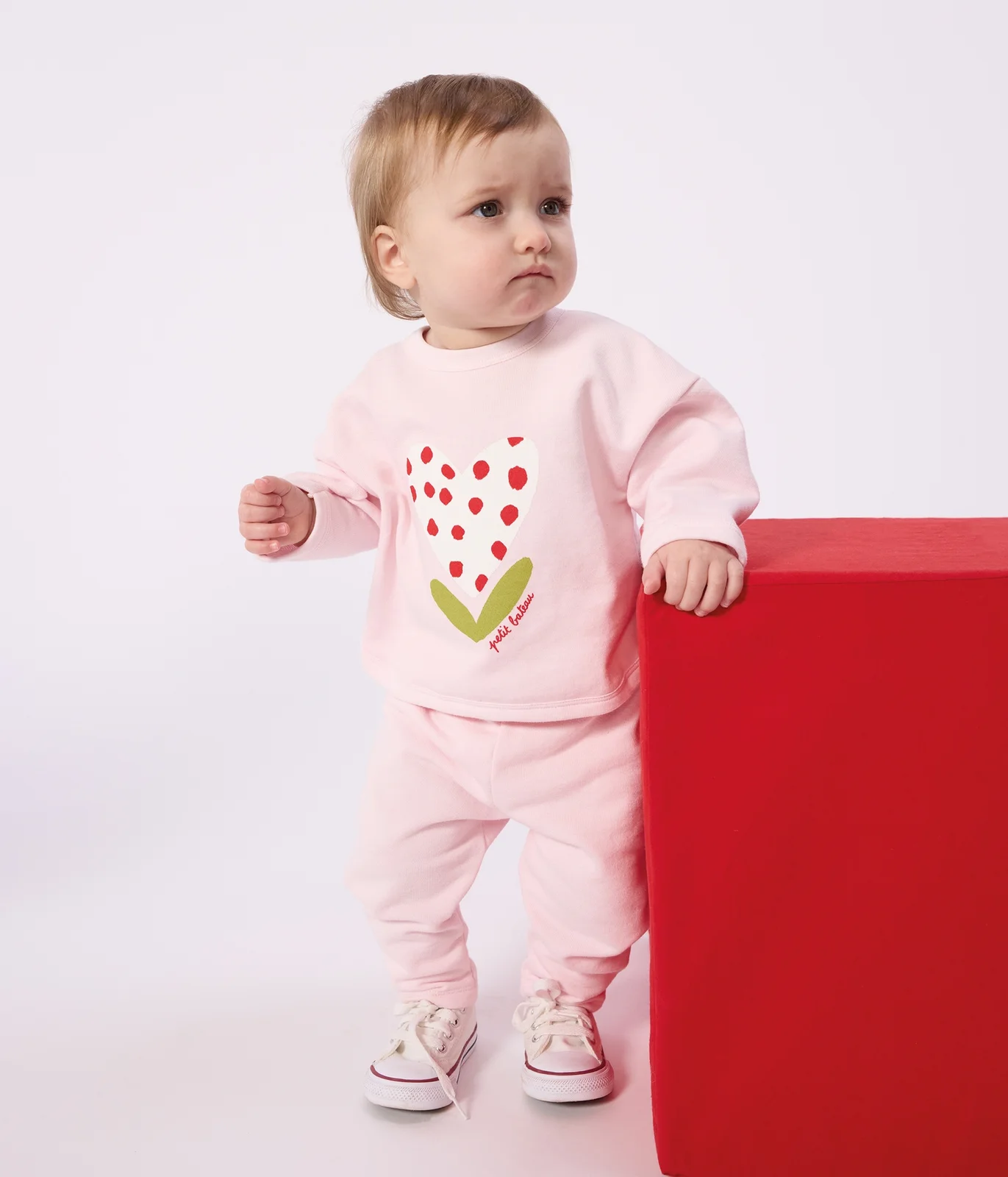 Babies' jogging bottoms in plain cotton