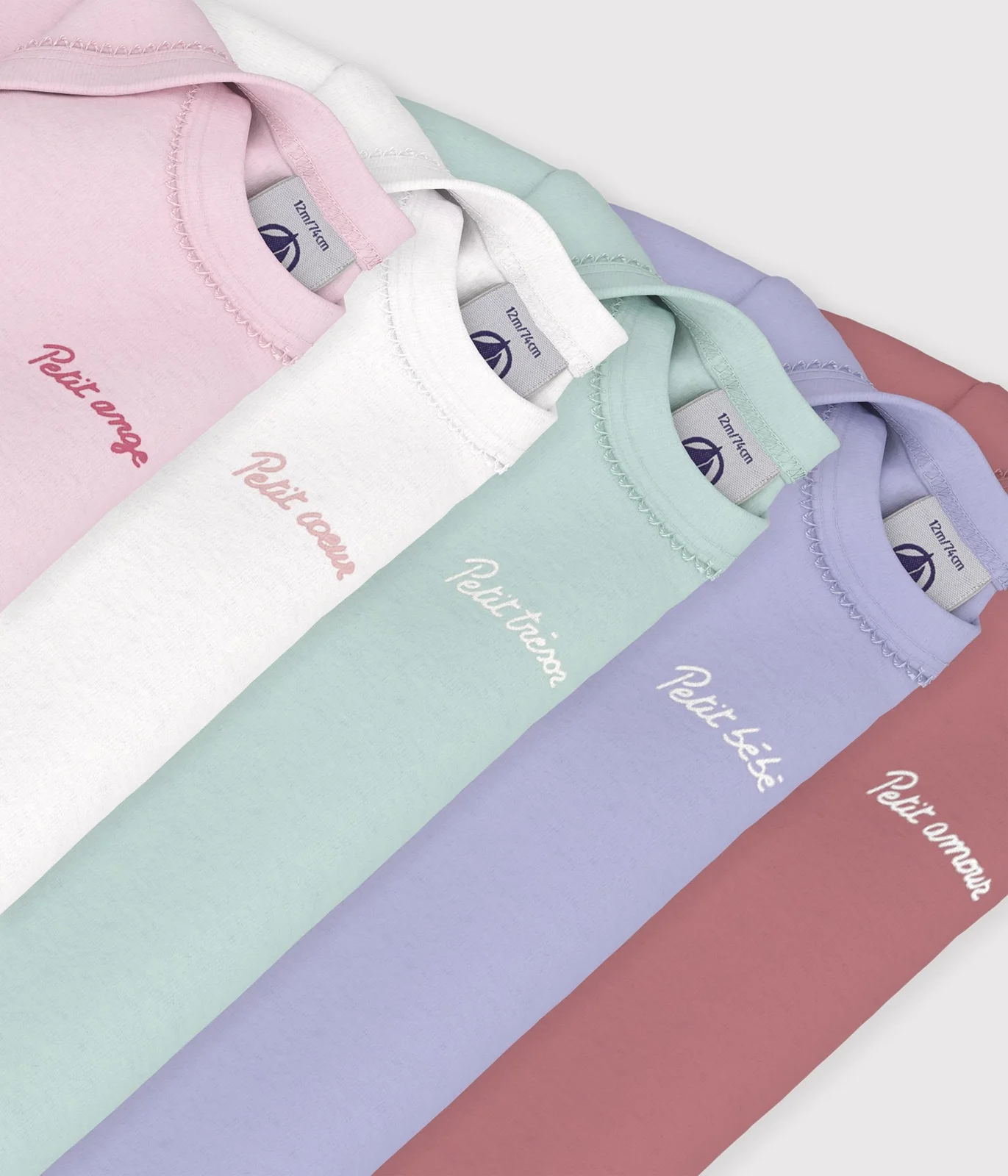 Pack of plain cotton long-sleeved bodies for babies