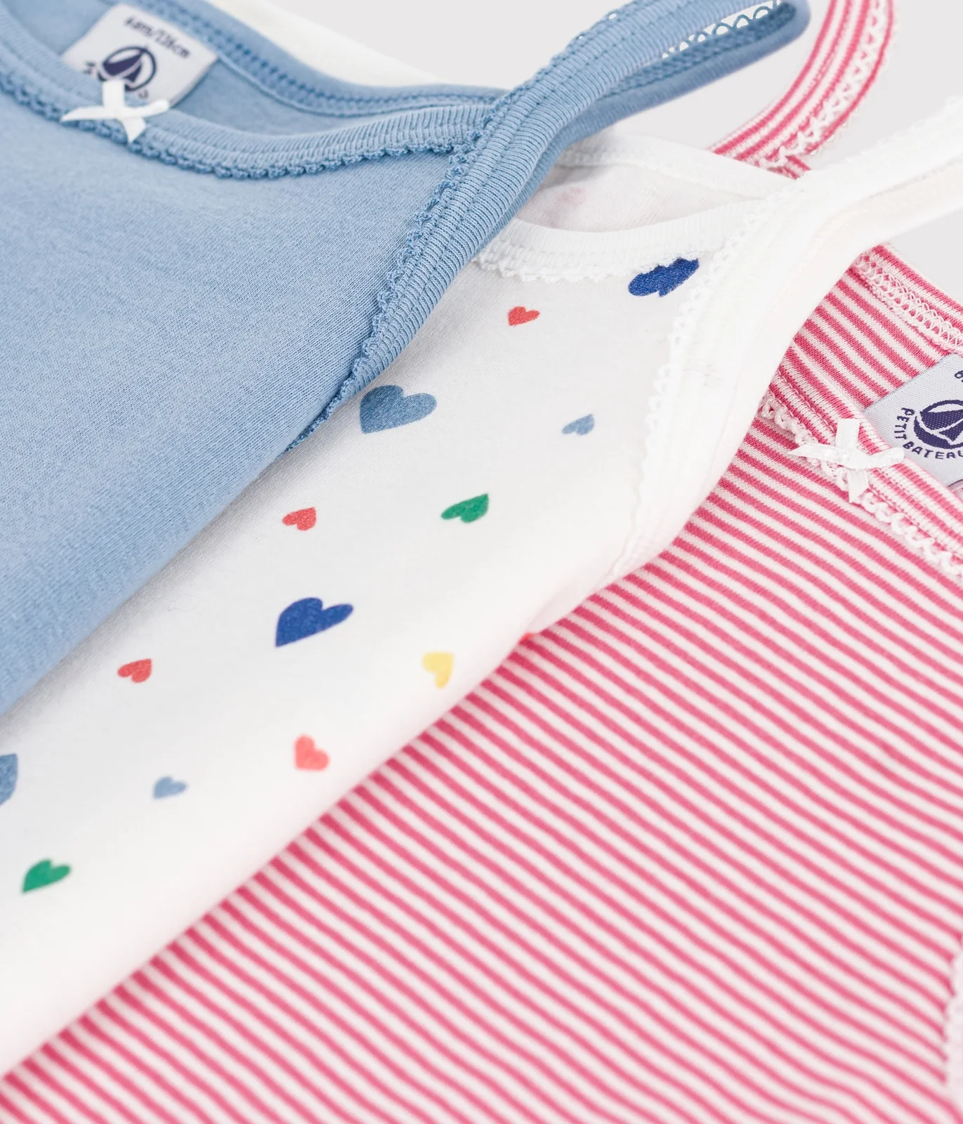 Pack of children's strappy heart-print cotton vests