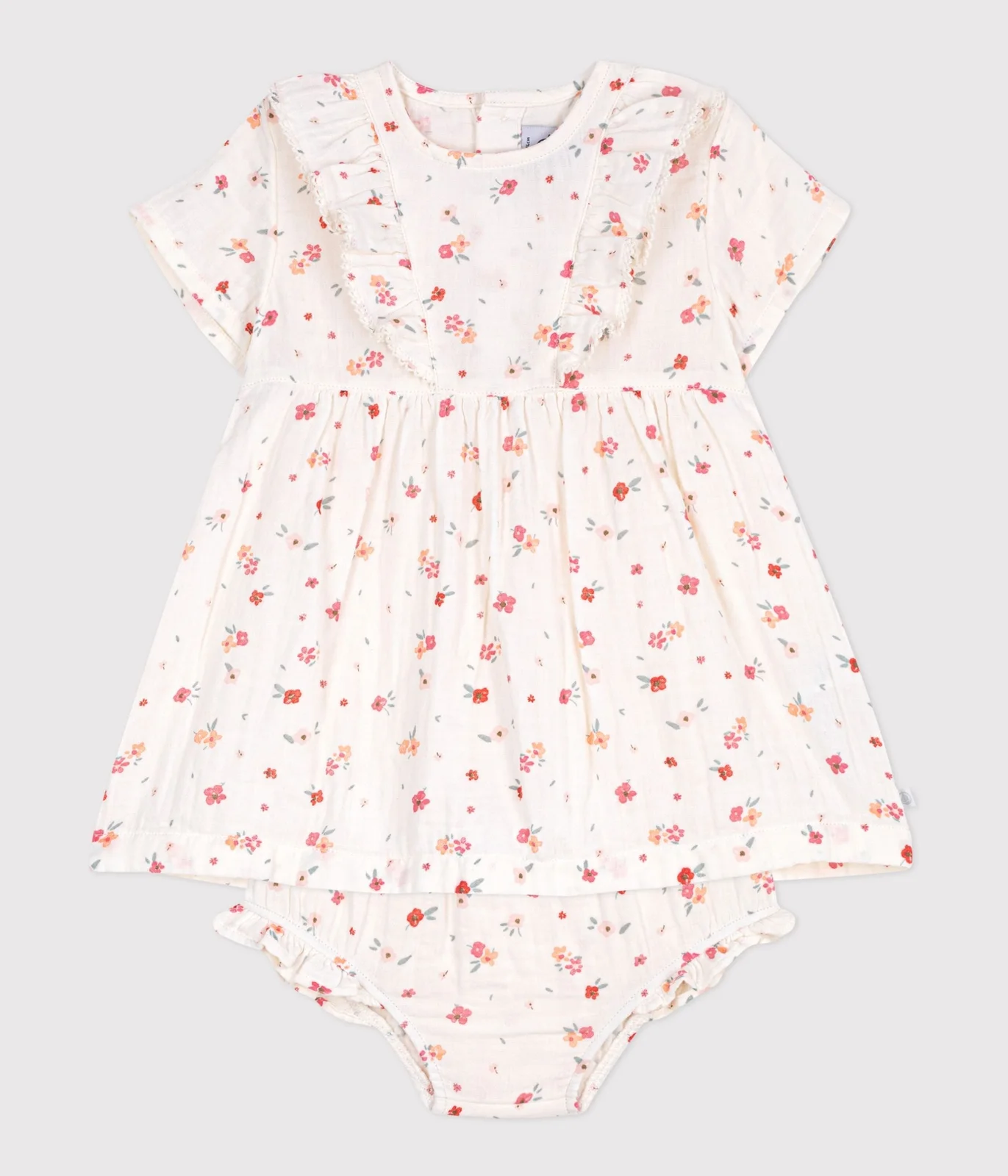 Sleeveless baby dress in printed cotton
