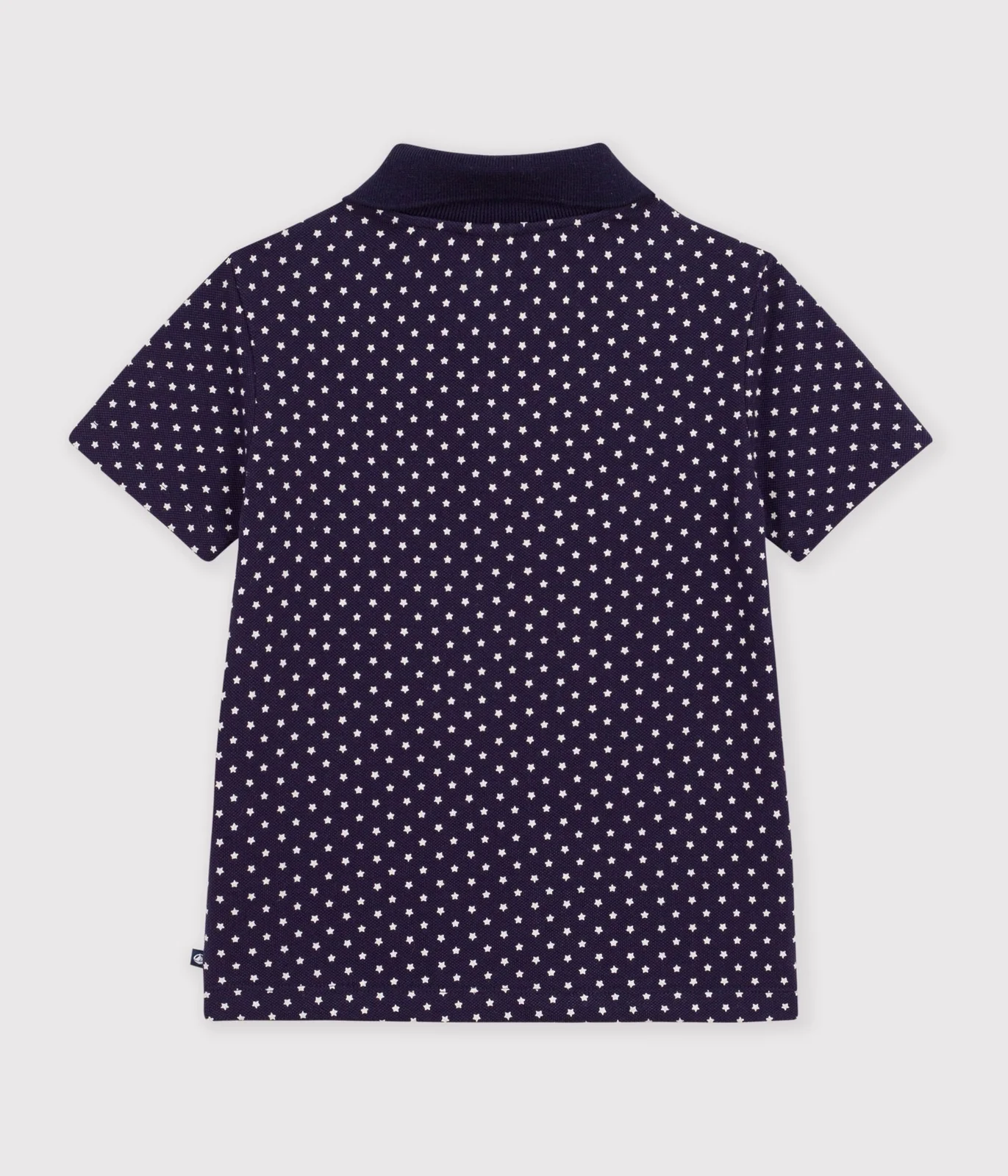 Children's cotton polo shirt with short sleeves and a star print