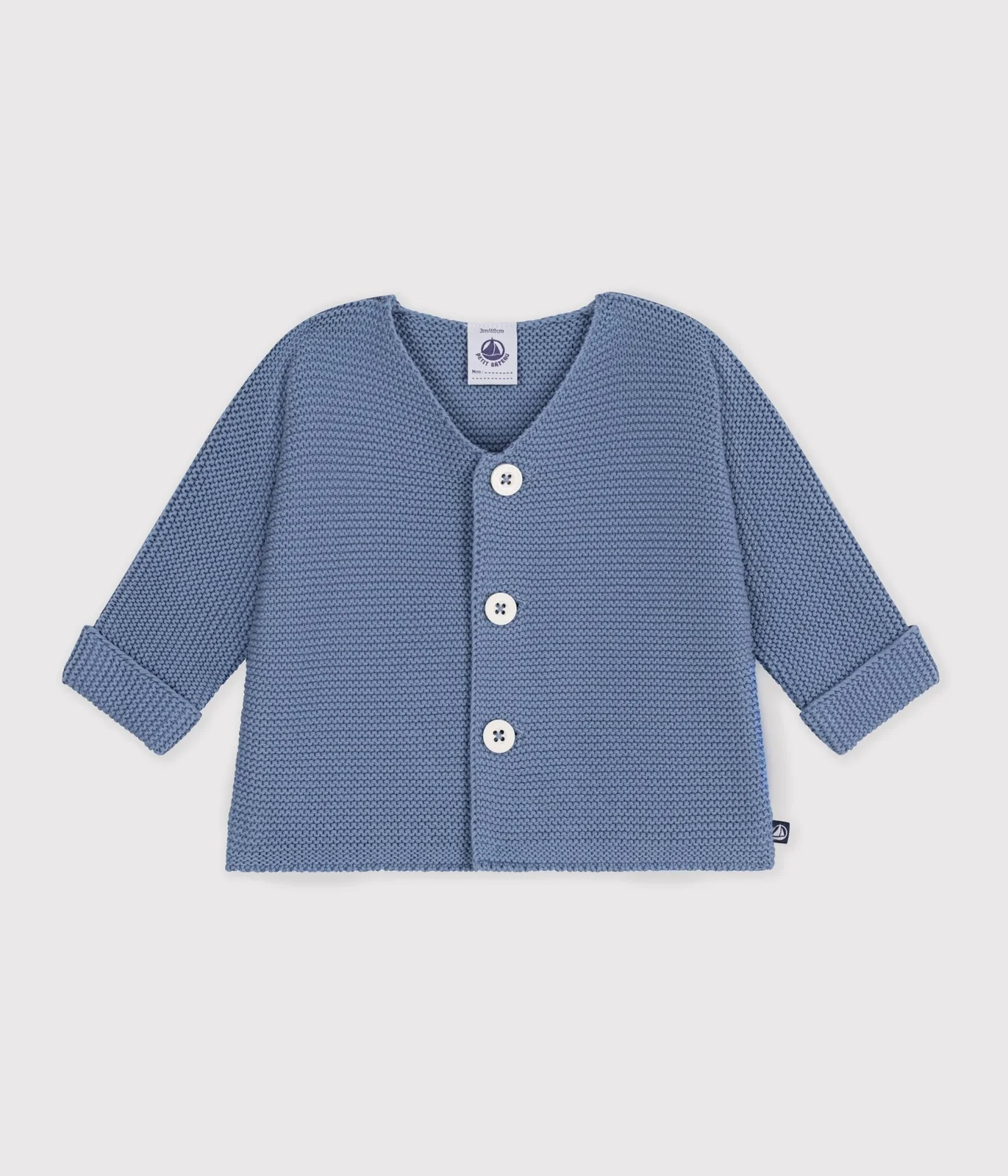 Baby cardigan knitted in garter stitch in plain cotton