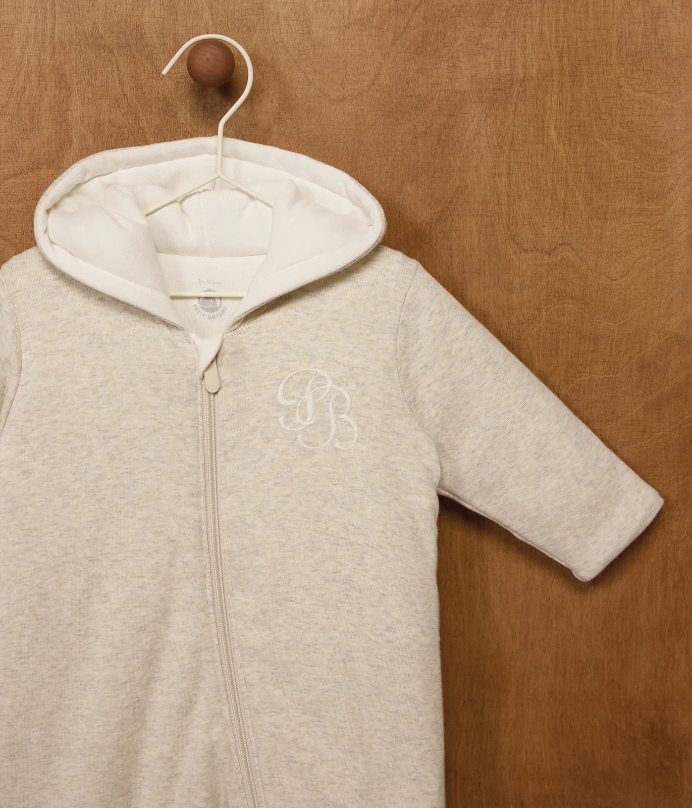 Babies' plain padded jumpsuit with a hood and feet