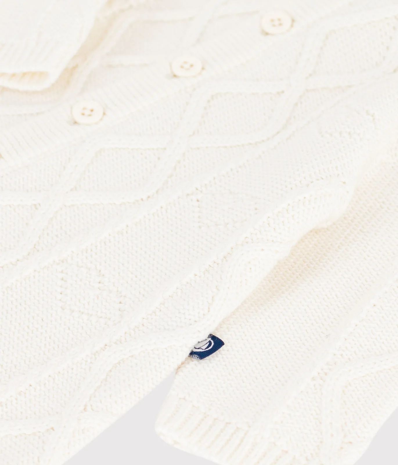 Babies' jumpsuit in a plain wool and cotton knit