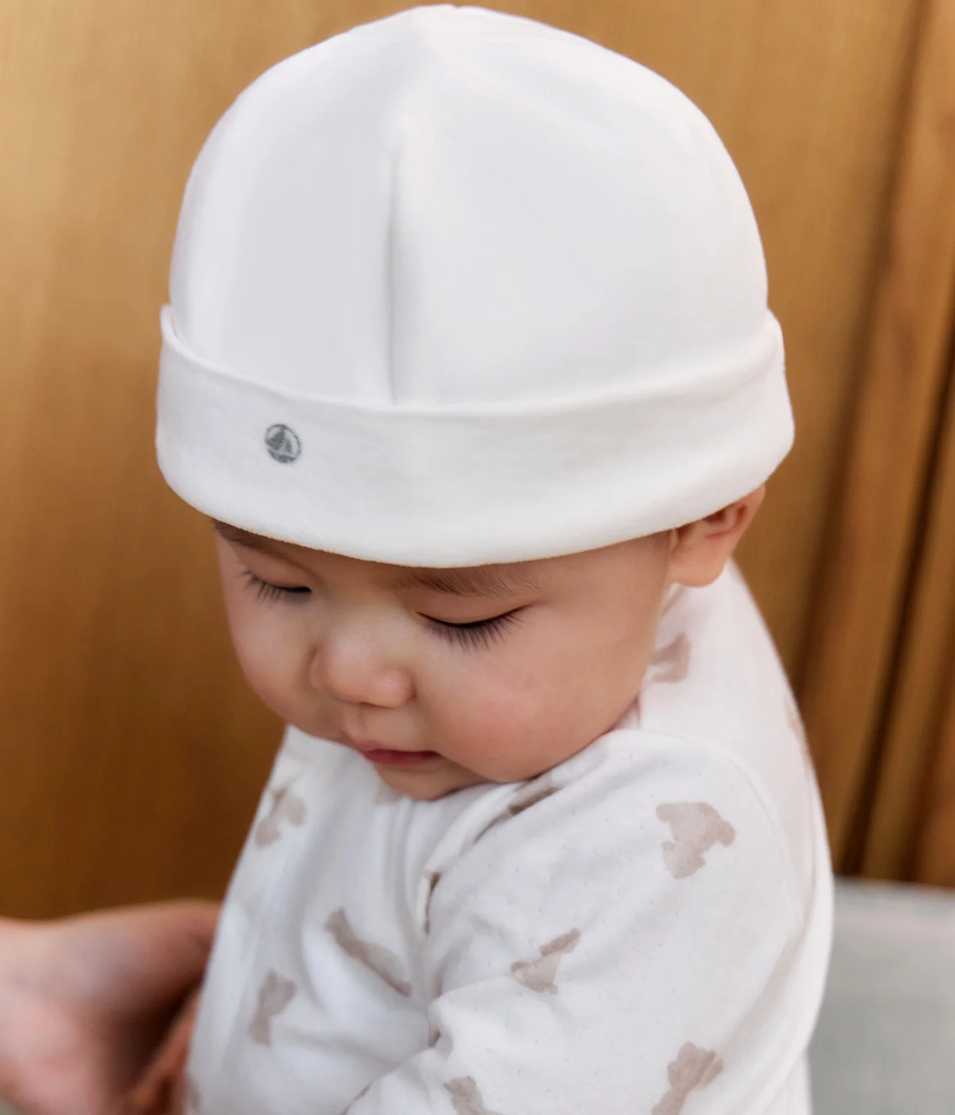 Newborn babies' terry velour bonnet