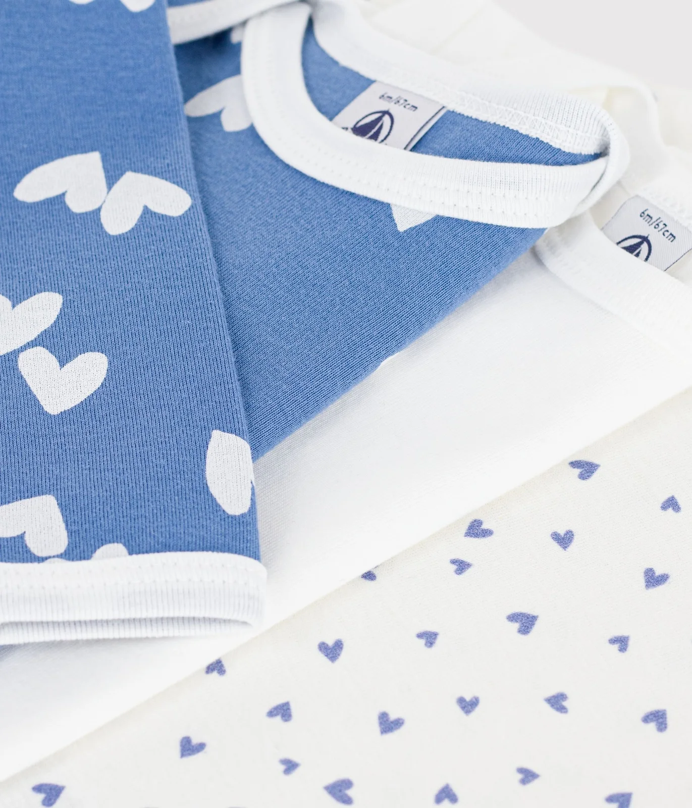 Pack of long-sleeved heart print cotton bodies for babies