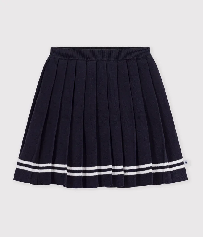 Children's short pleated skirt in plain cotton knit