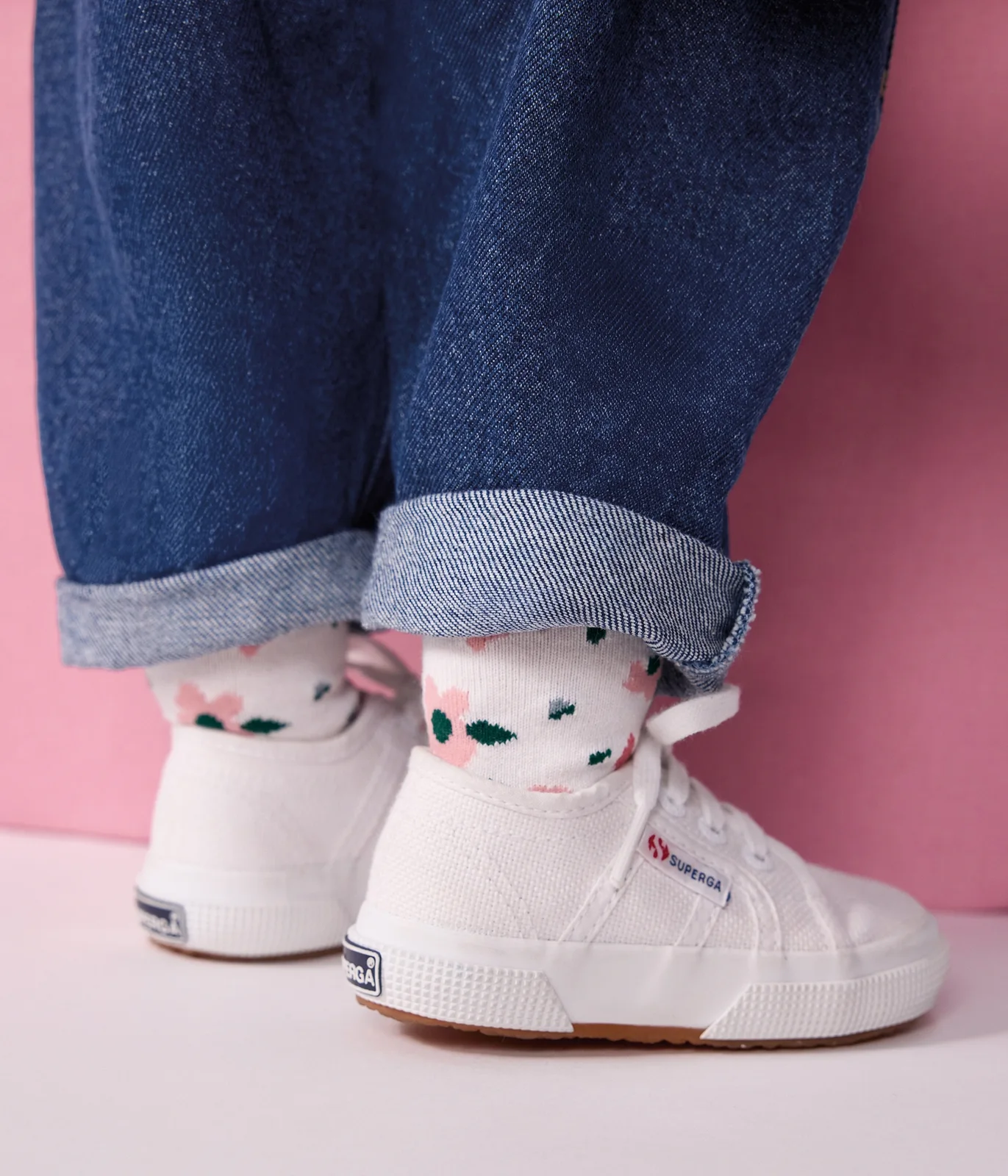 2 pairs of babies' cotton socks with stripes and a floral print