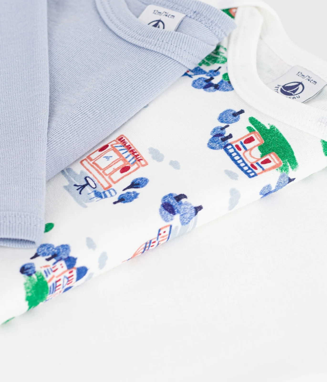 Pack of long-sleeved Paris print cotton bodies for babies