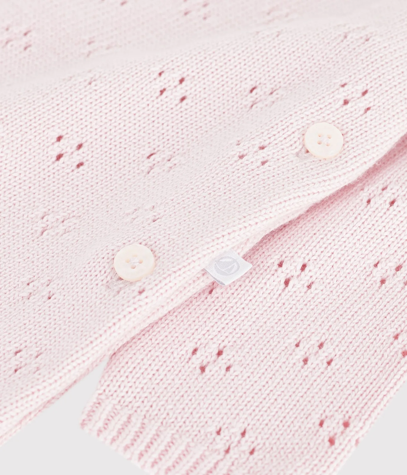 Babies' jumpsuit in wool and cotton knit with a plain collar