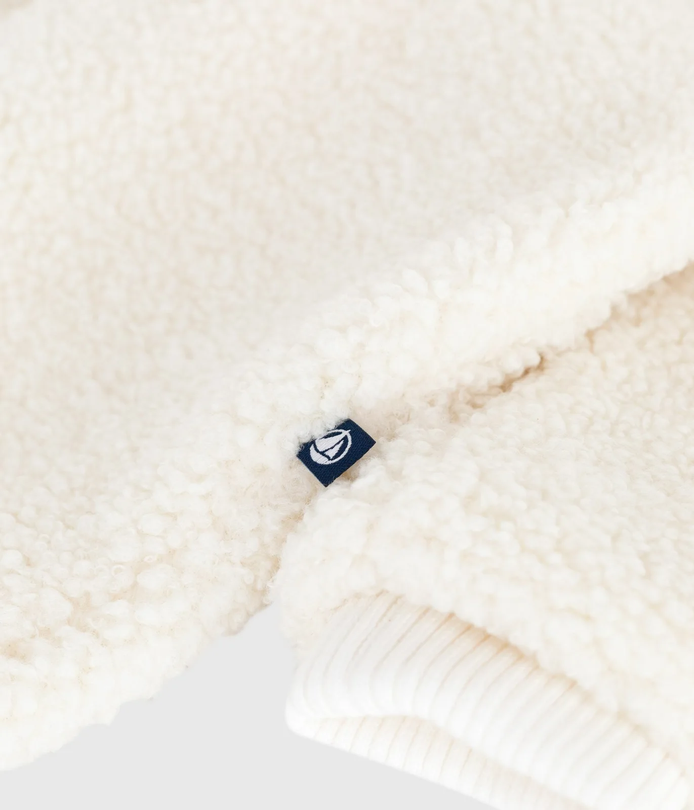Babies' sherpa snowsuit with ears and a pinstriped lining