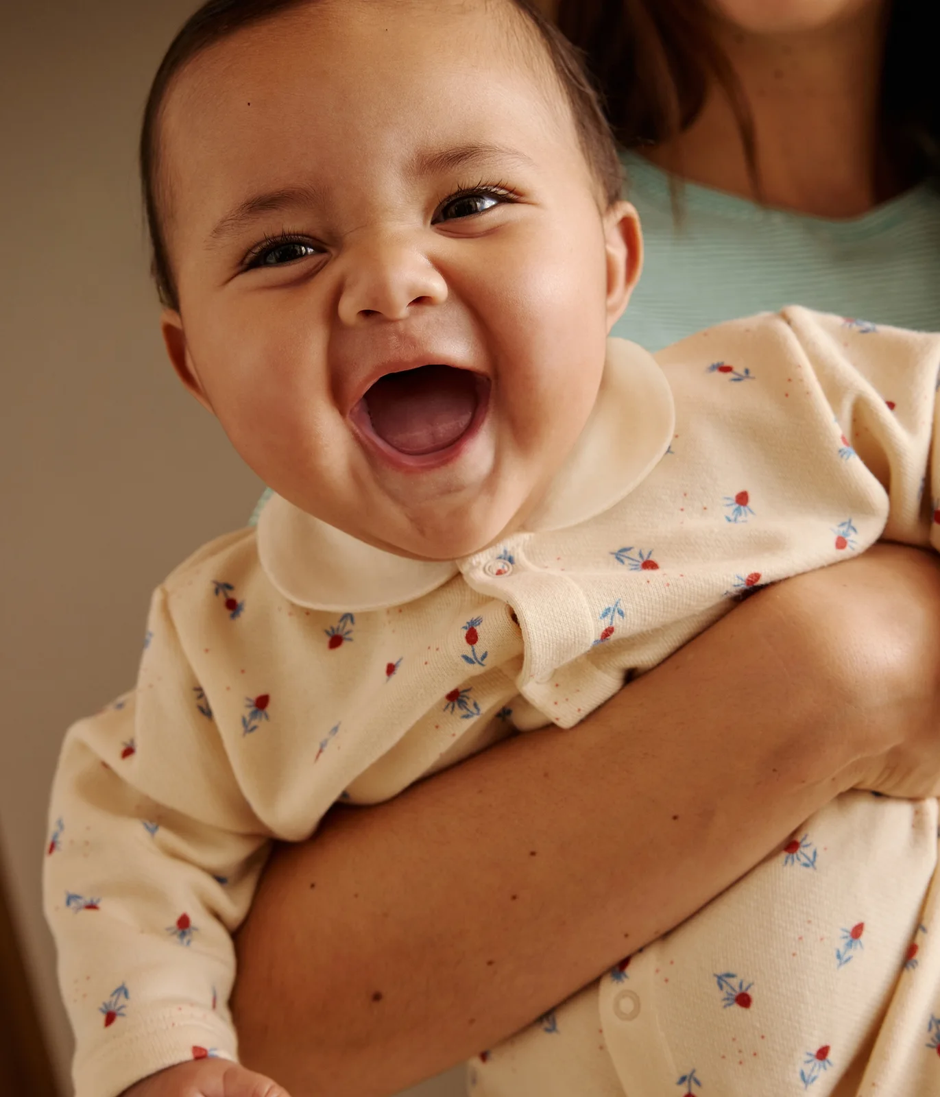 Babies' floral print cotton playsuit with a collar