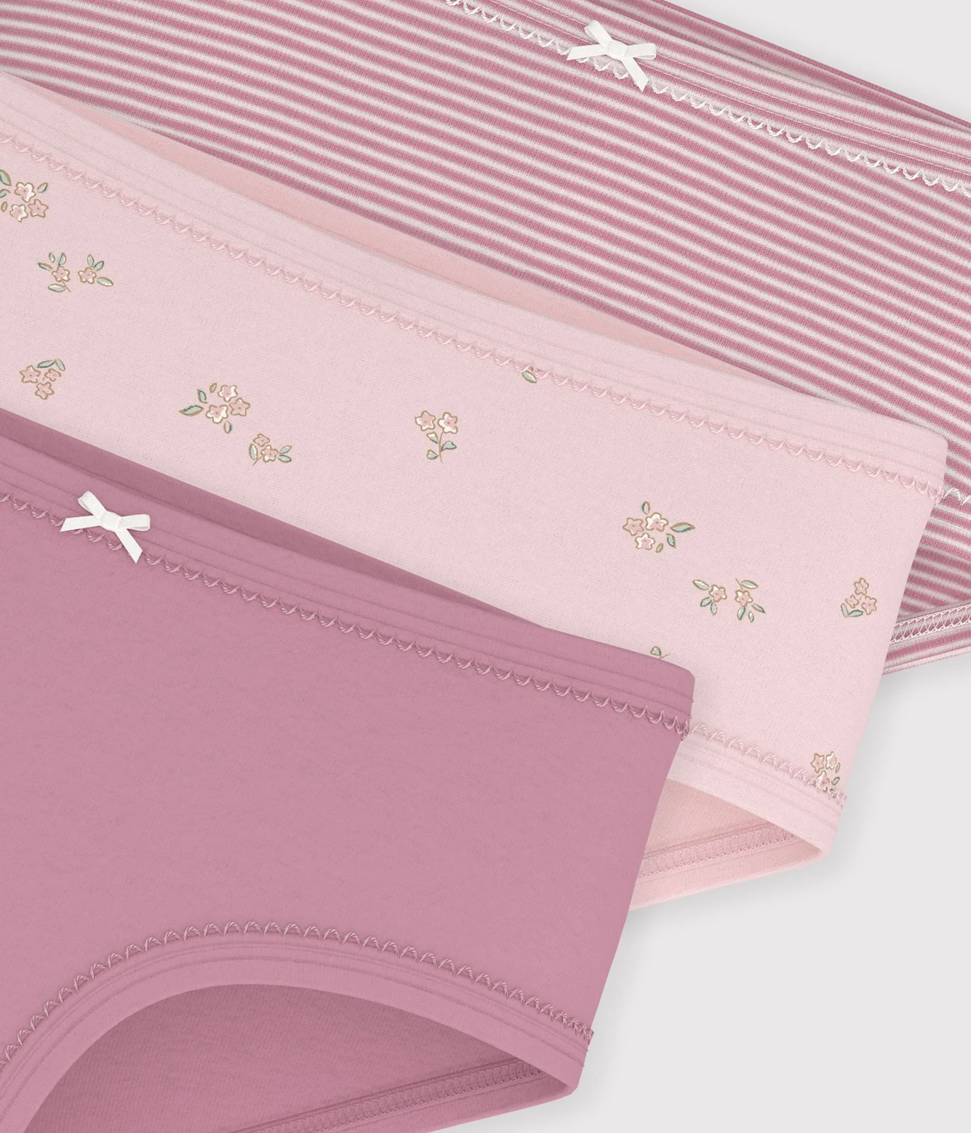 Pack of children's high-waisted cotton pants with a flower pattern