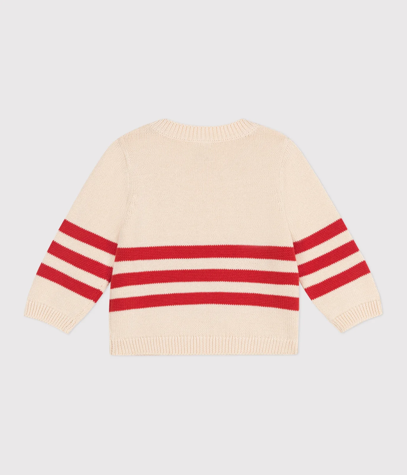 Babies' cotton jumper with placed stripes and a badge on the chest