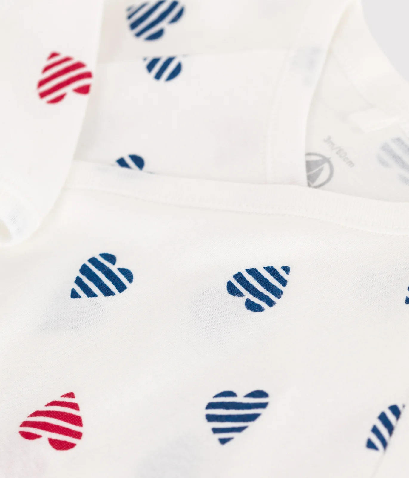 Babies' stripy heart-patterned cotton pyjamas