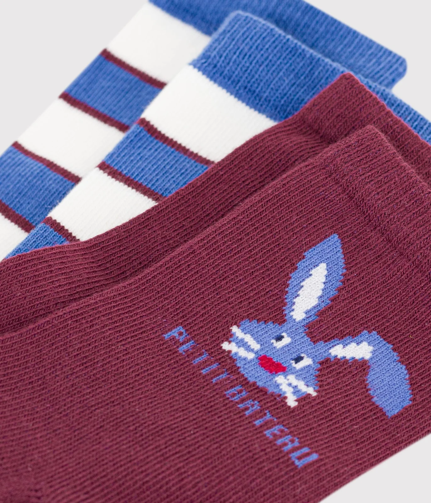 2 pairs of children's cotton socks with stripes and an animal pattern