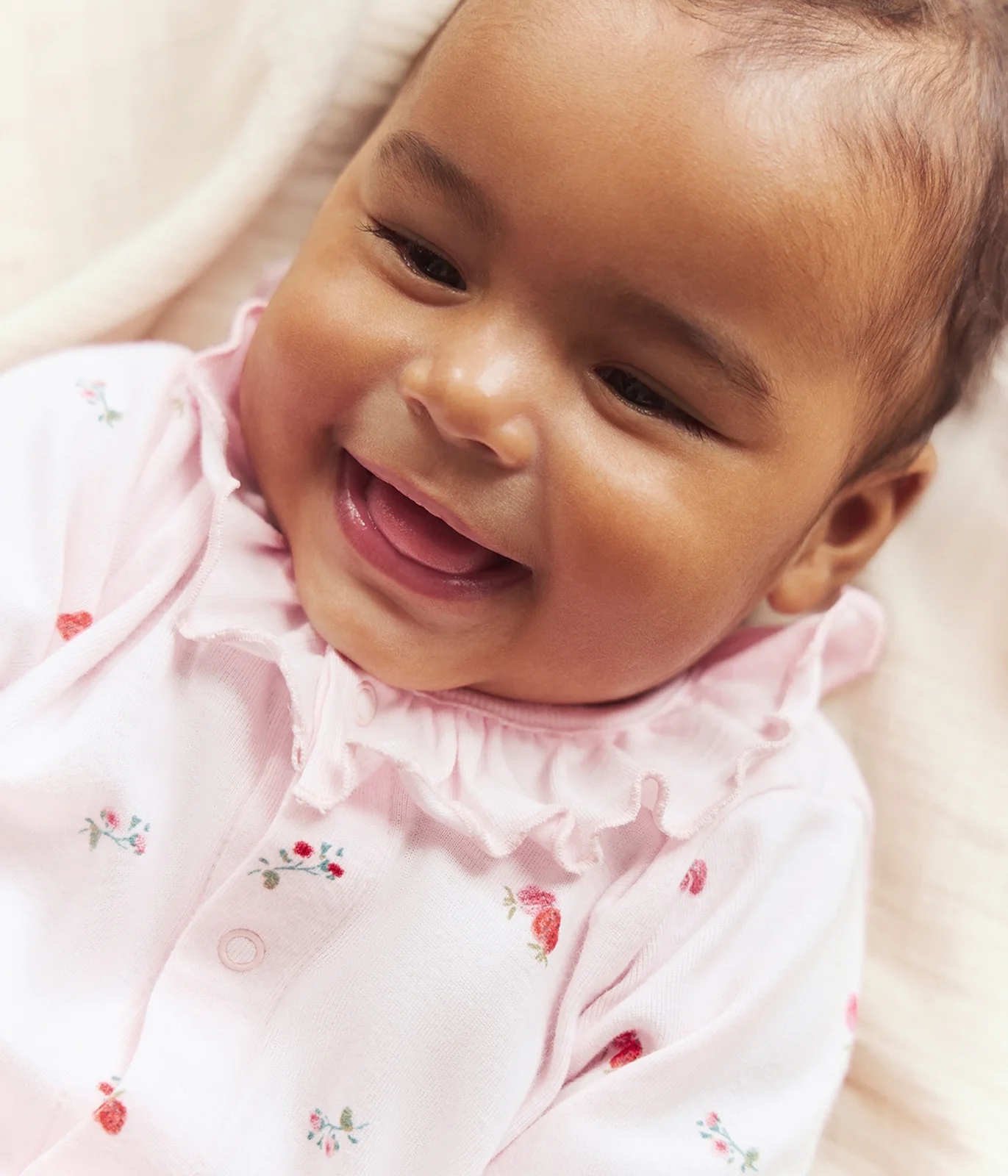 Babies' floral cotton pyjama suit with a collar