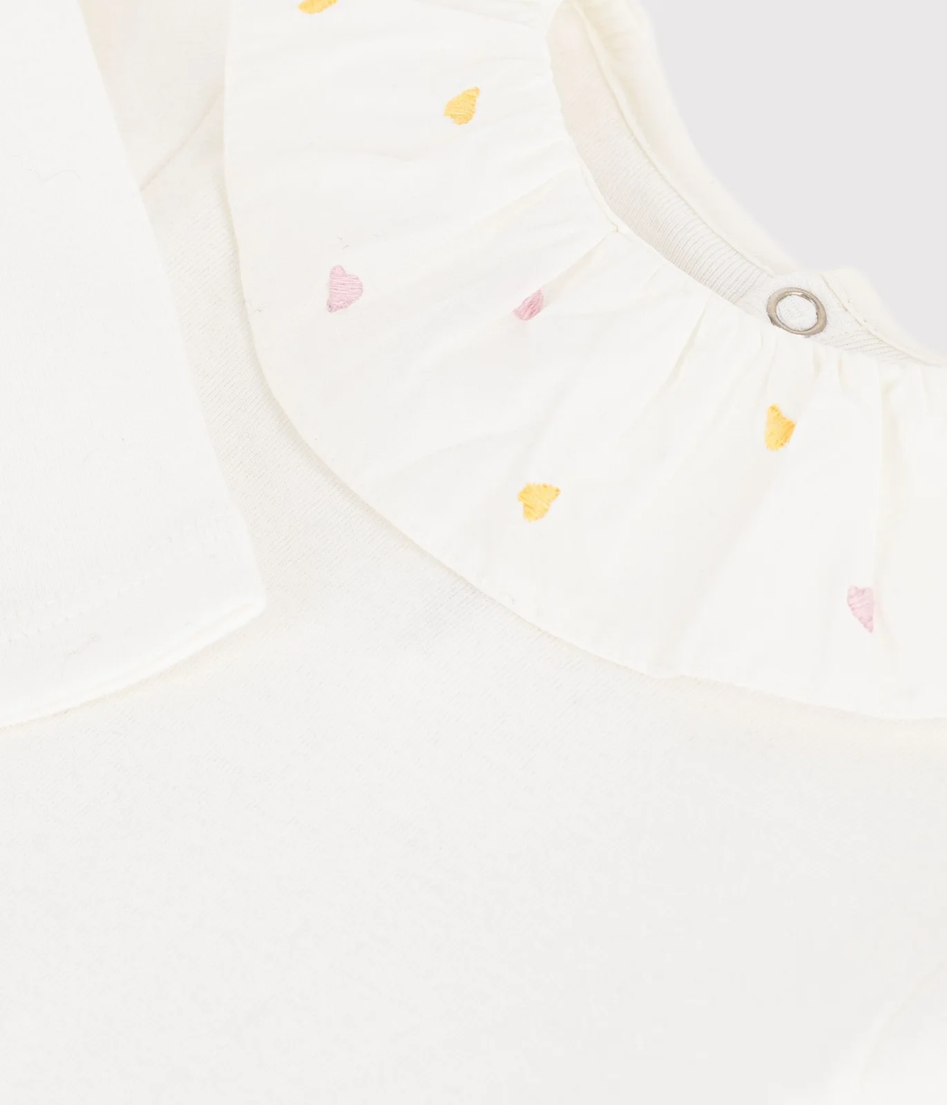 Babies' plain cotton body with an embroidered collar