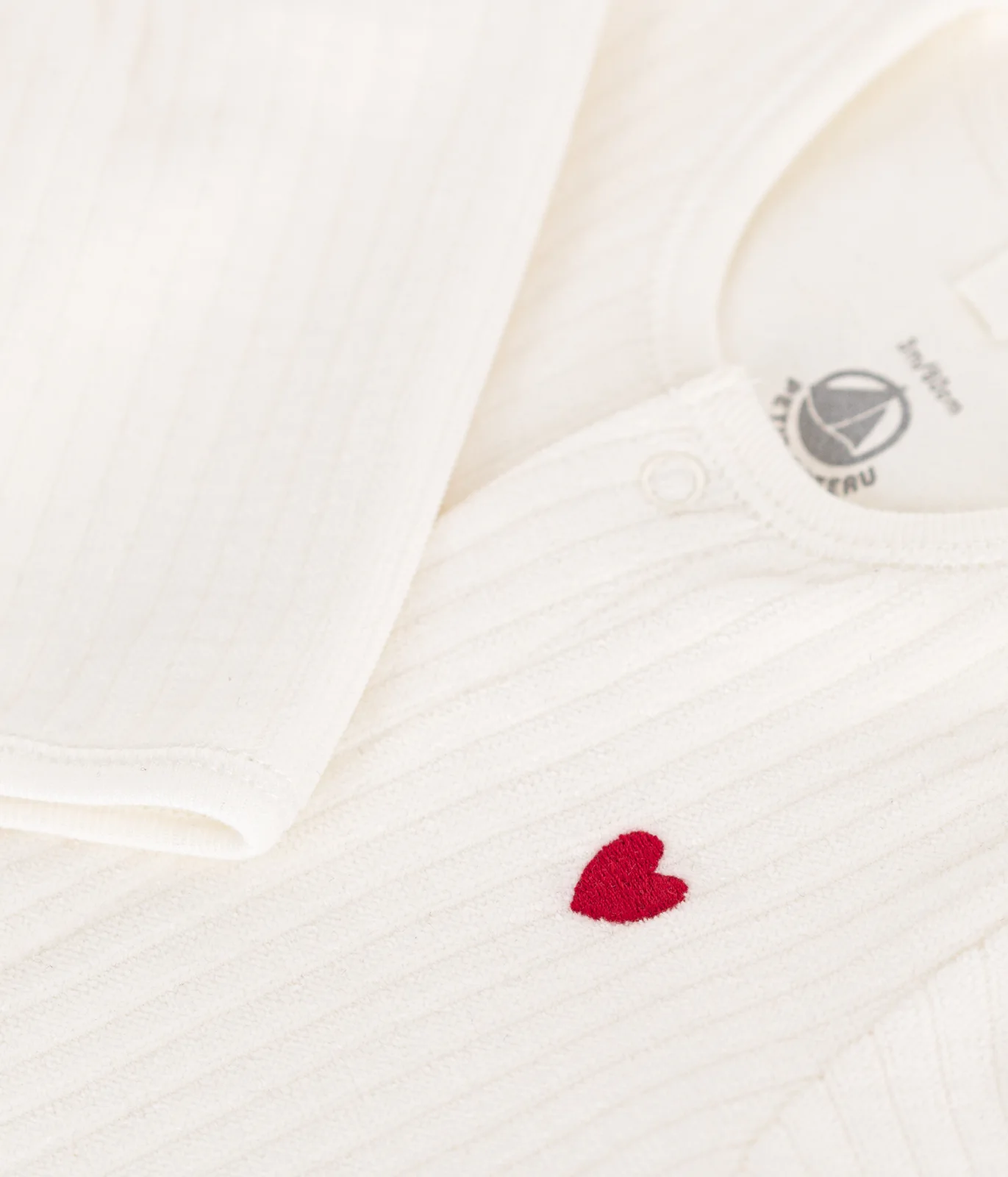 Unisex Velour sleepsuit with integrated solid- bodysuit