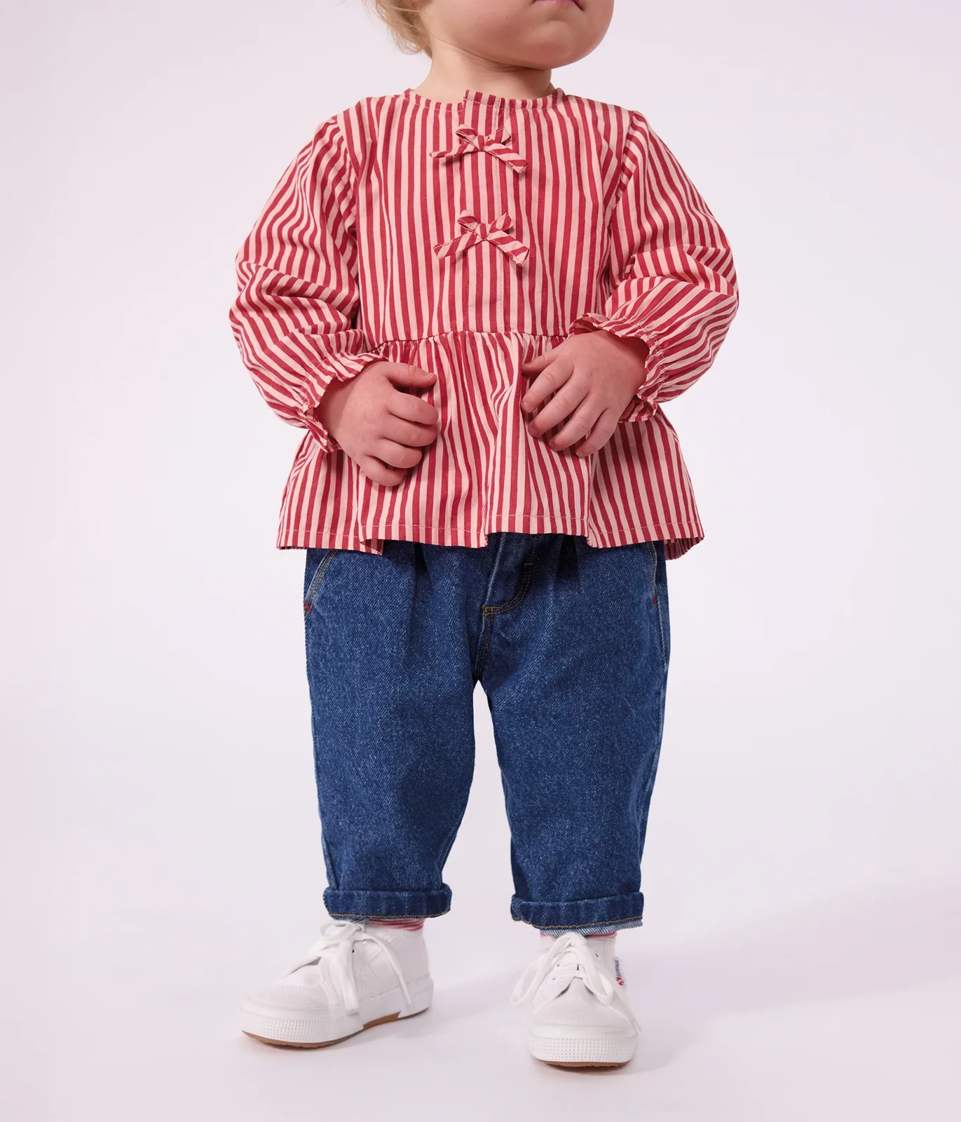 Babies' trousers in plain denim with heart embroidery