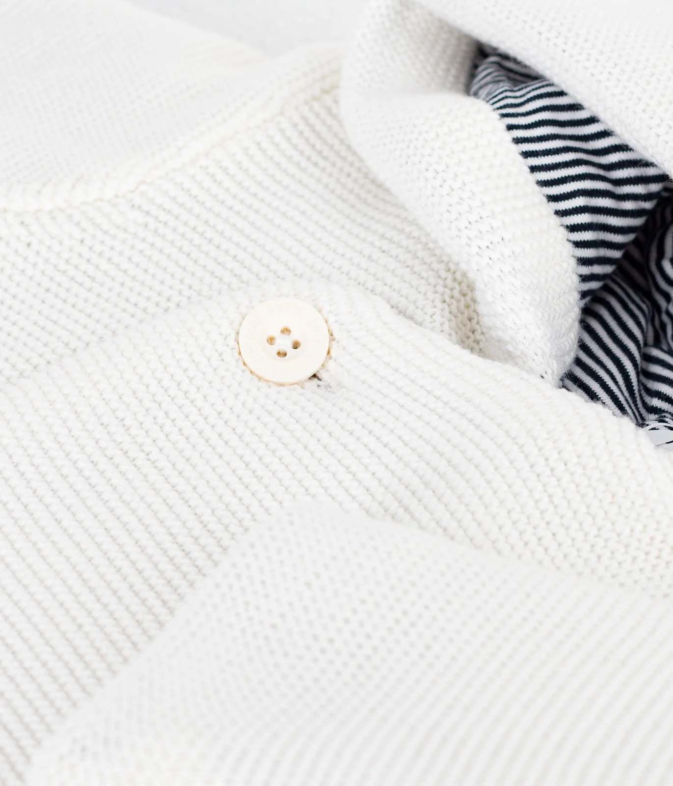 Babies' padded knitted jacket with a pinstripe lining