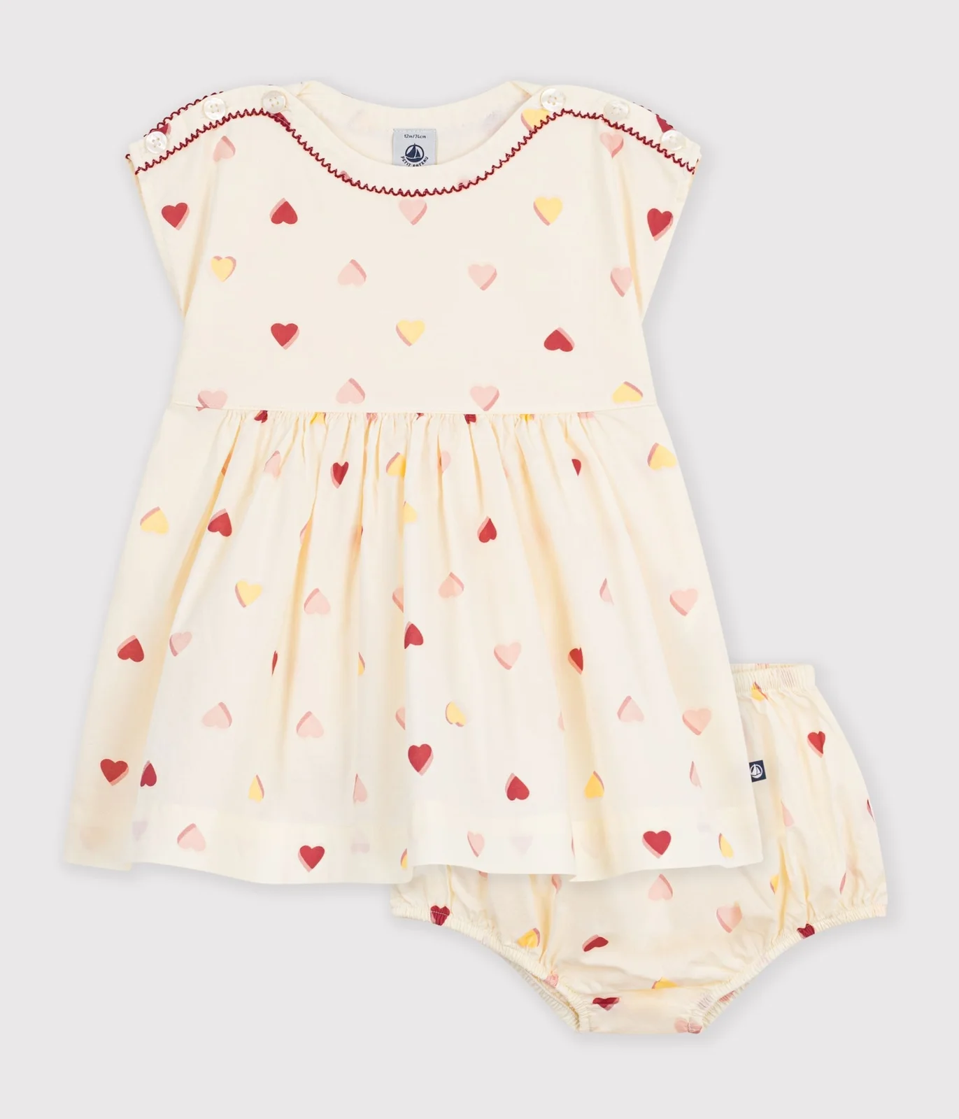 Babies' short-sleeved cotton dress printed with hearts.