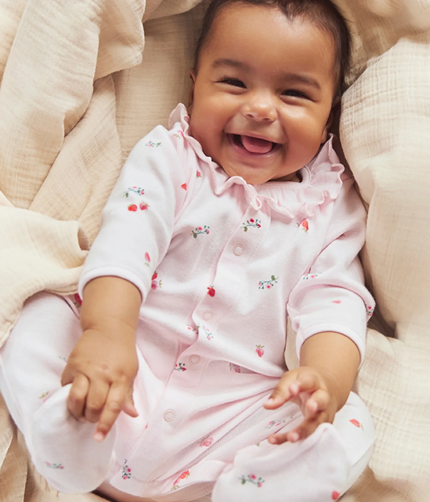 Babies' floral cotton pyjama suit with a collar
