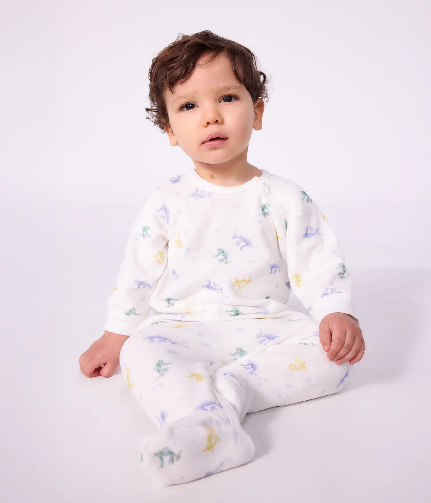 Babies' velour pyjama suit printed with dragons