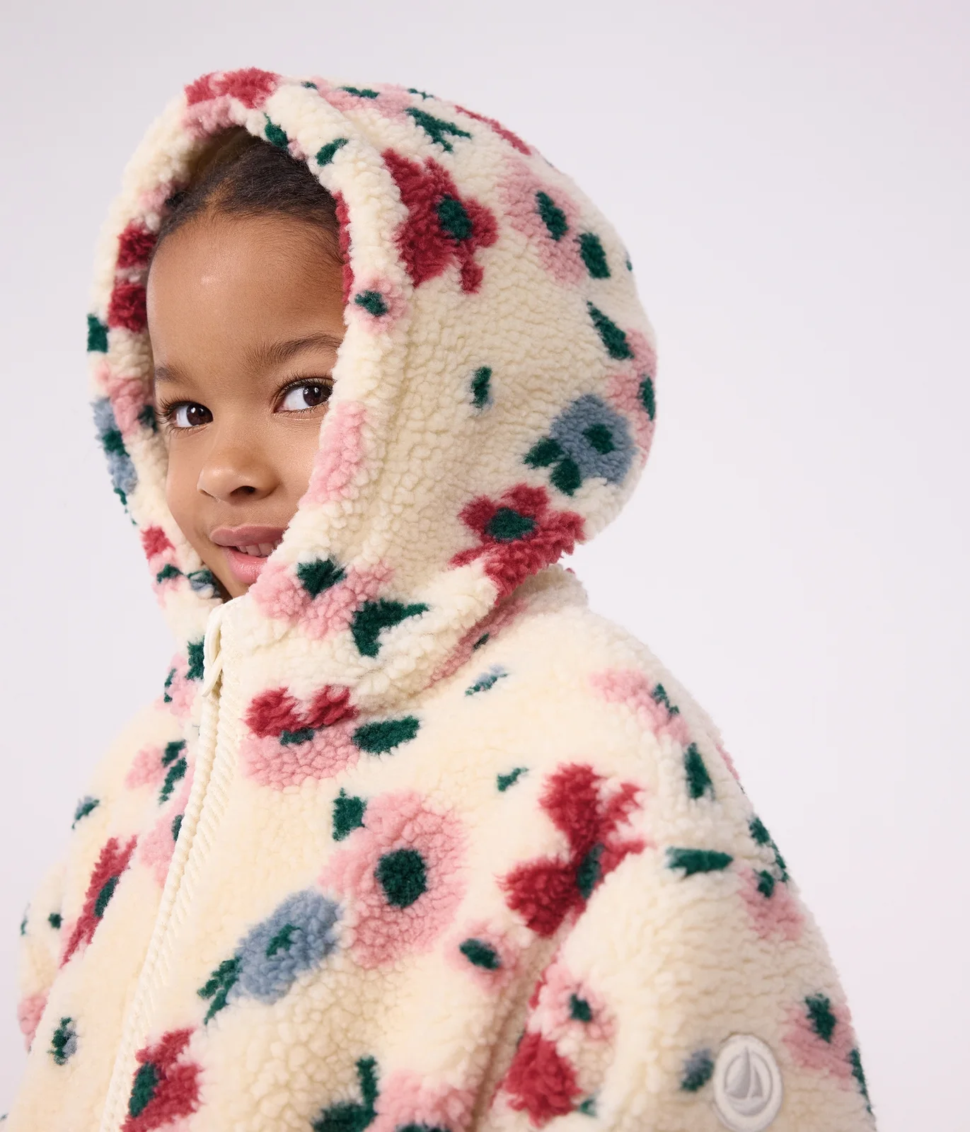Children's hooded jacket in floral sherpa
