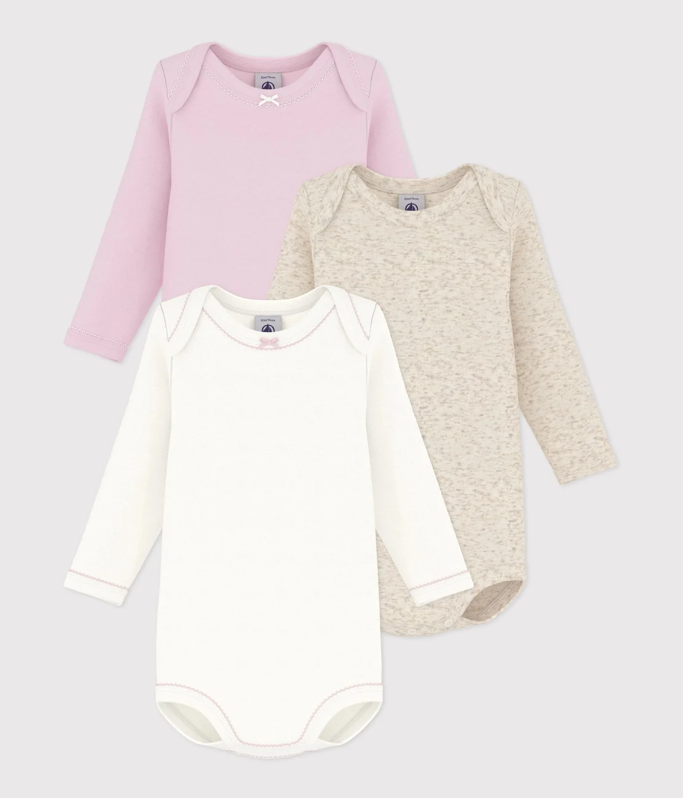 Pack of plain cotton long-sleeved baby bodies