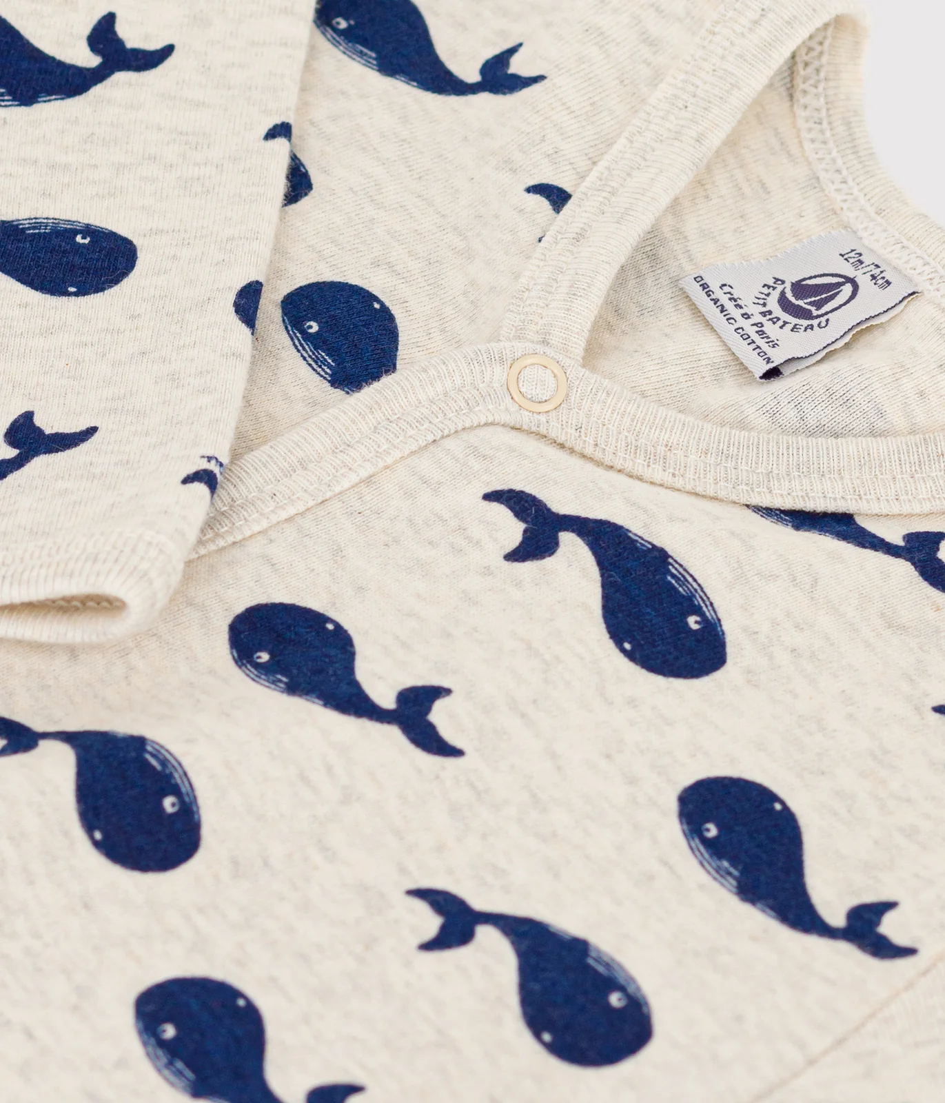 Baby's footless sleepsuit in whale-print cotton
