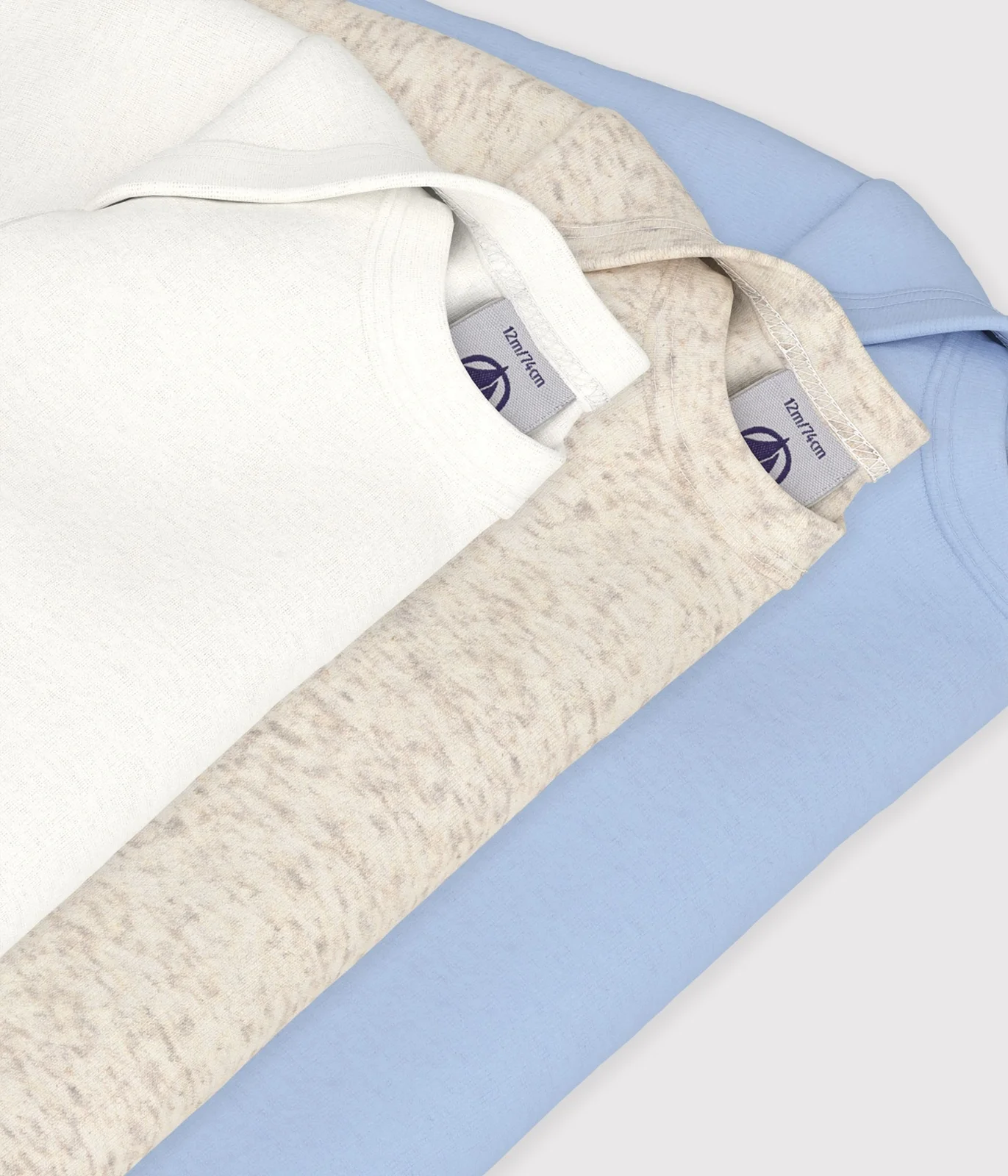 Pack of plain cotton long-sleeved baby bodies