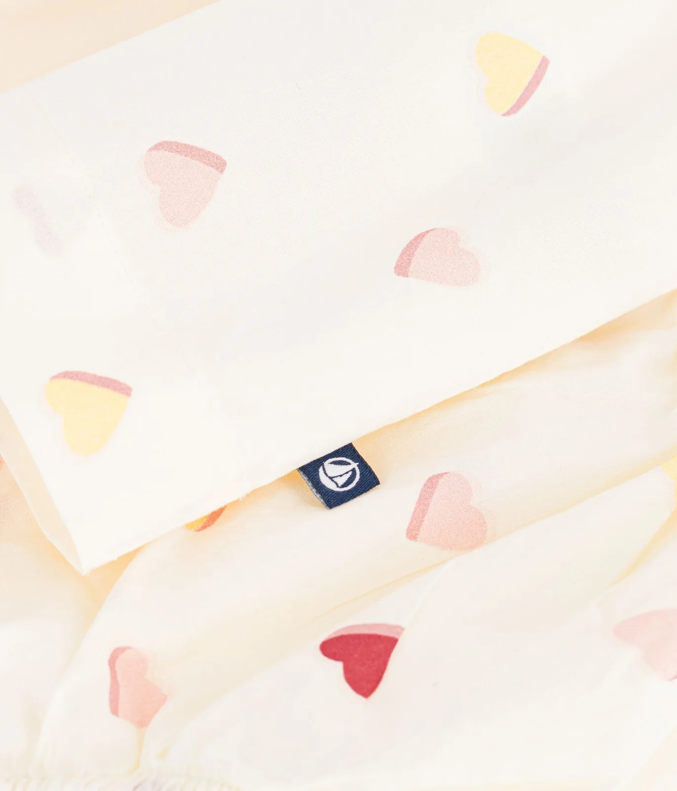 Babies' short-sleeved cotton dress printed with hearts.