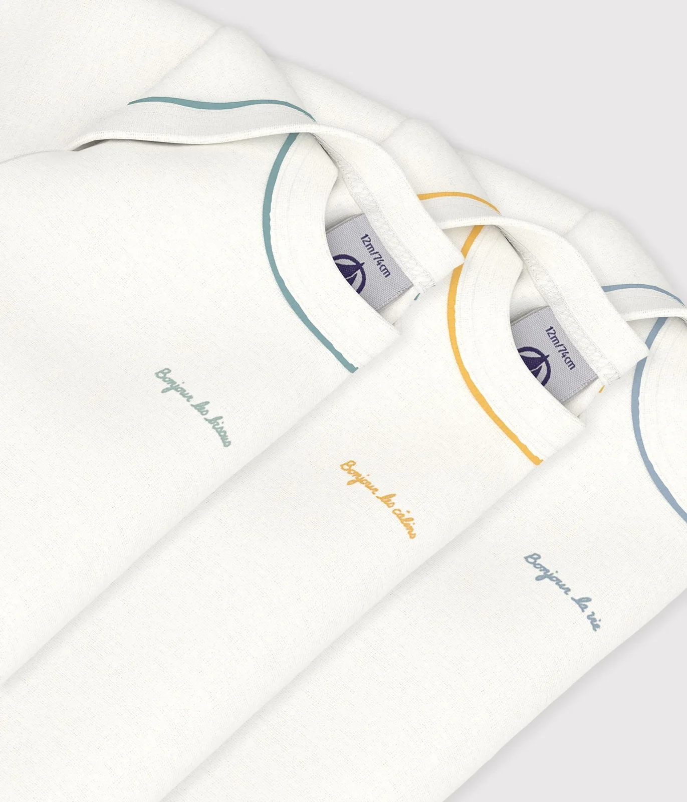 Pack of plain cotton long-sleeved baby bodies