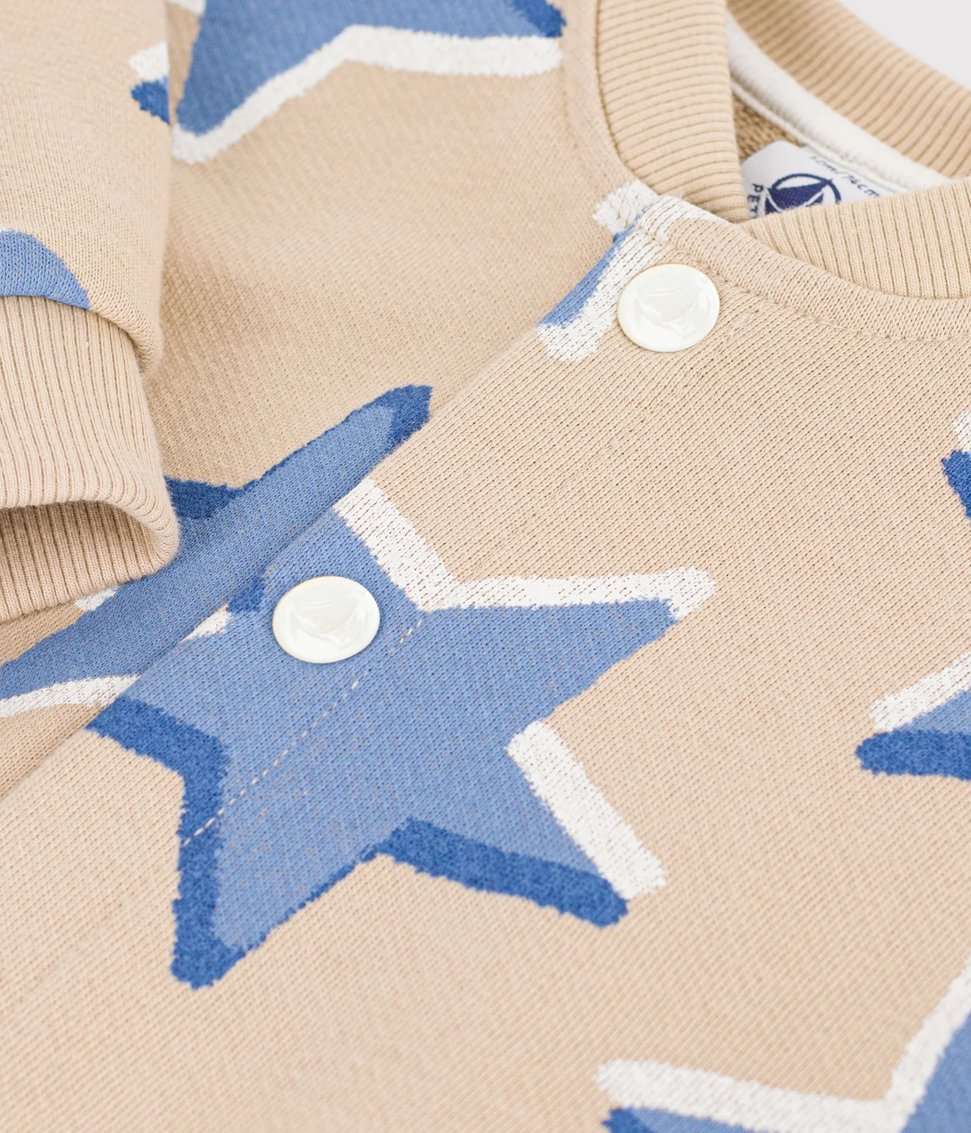 Babies' long jumpsuit in cotton with a star print