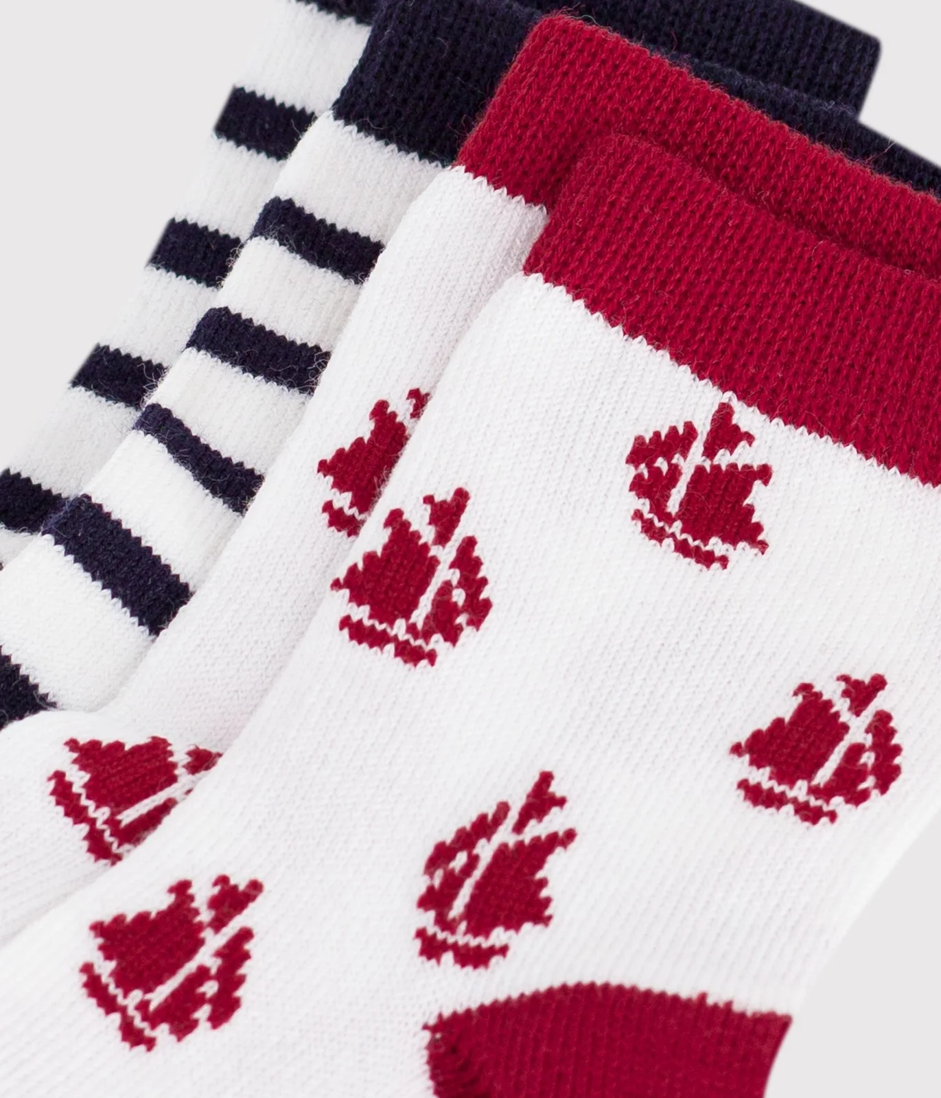 2 pairs of baby cotton socks with stripes and a boat print
