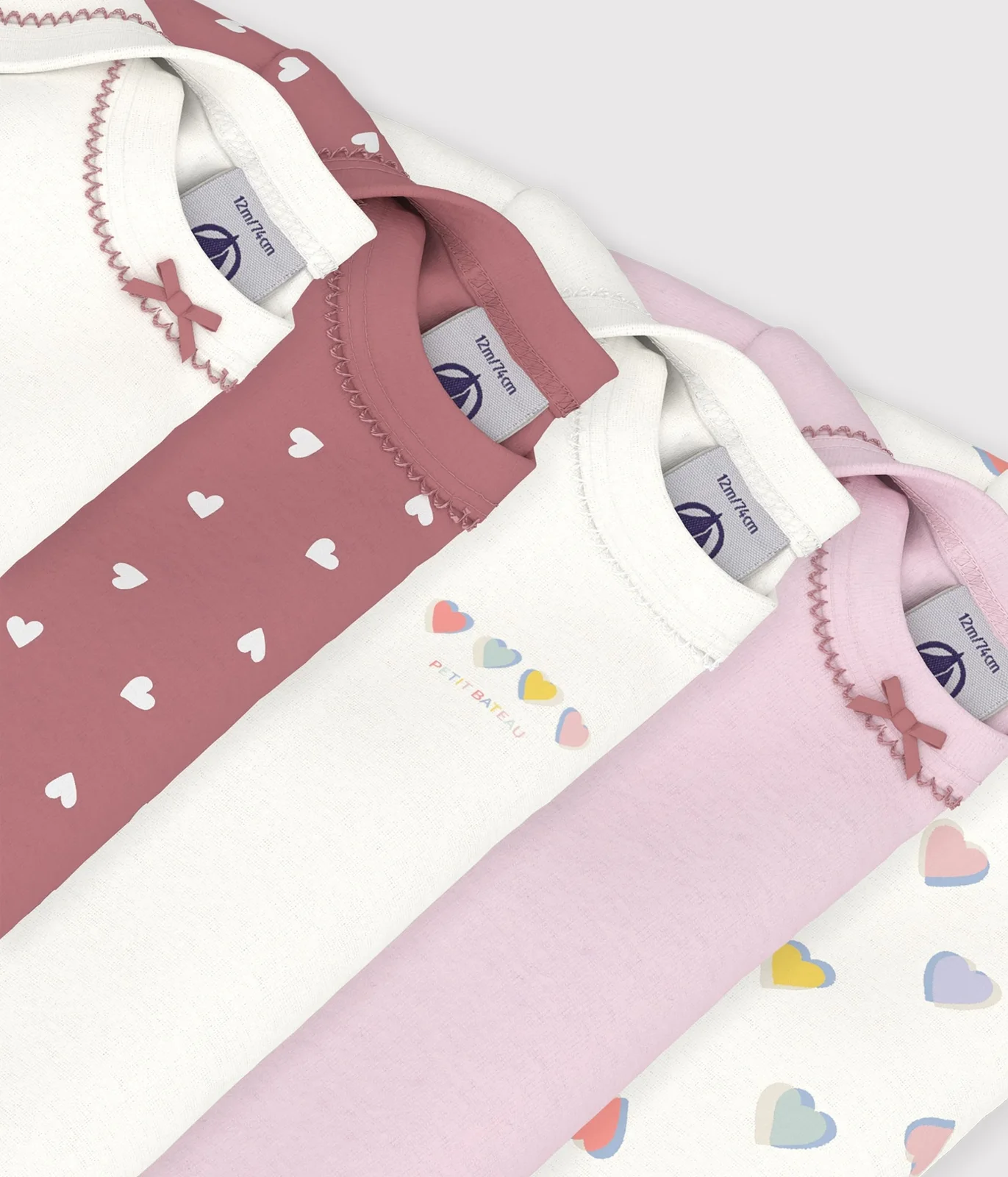 Pack of long-sleeved heart-print cotton bodies for babies