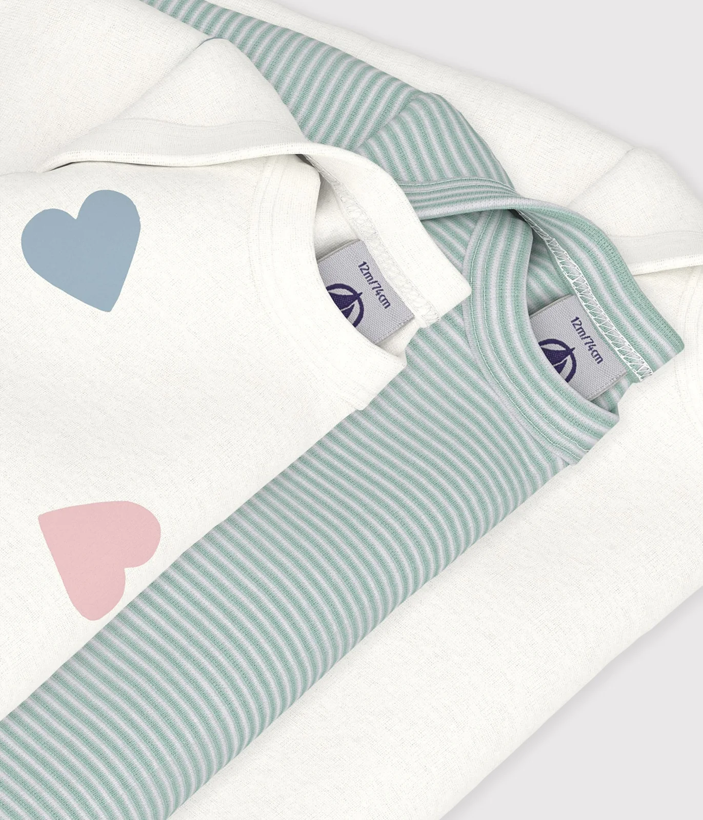 Set of long-sleeved baby bodysuits in cotton with heart print
