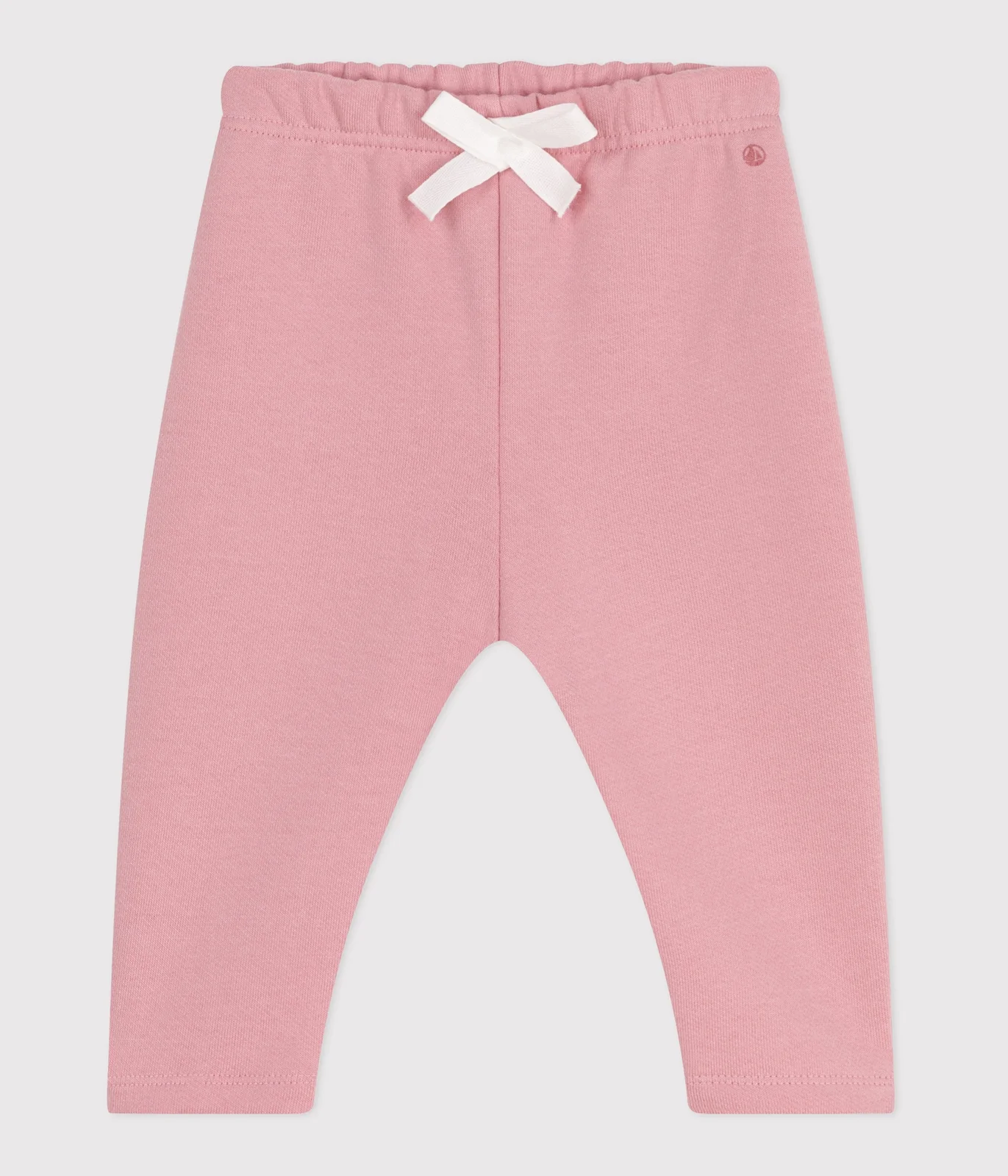 Babies' jogging bottoms in plain cotton