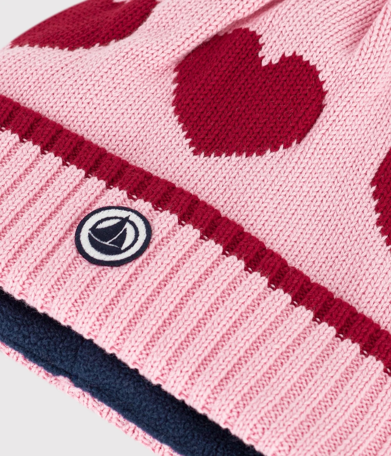 Children's jacquard knitted beanie hat lined in polar fleece
